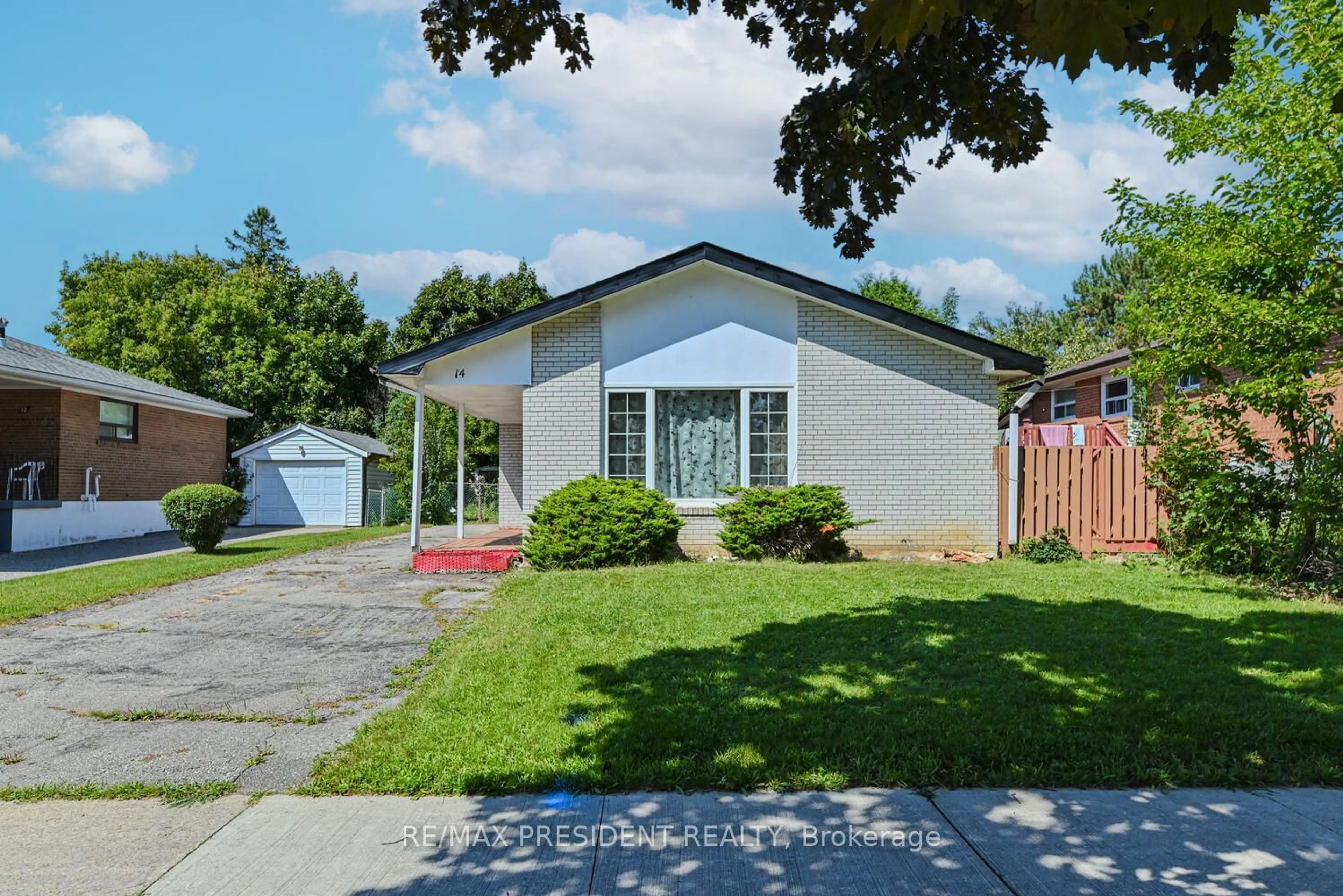 Frontside or backside of a home, cottage for 14 Milkwood Ave, Toronto Ontario M9V 1M1