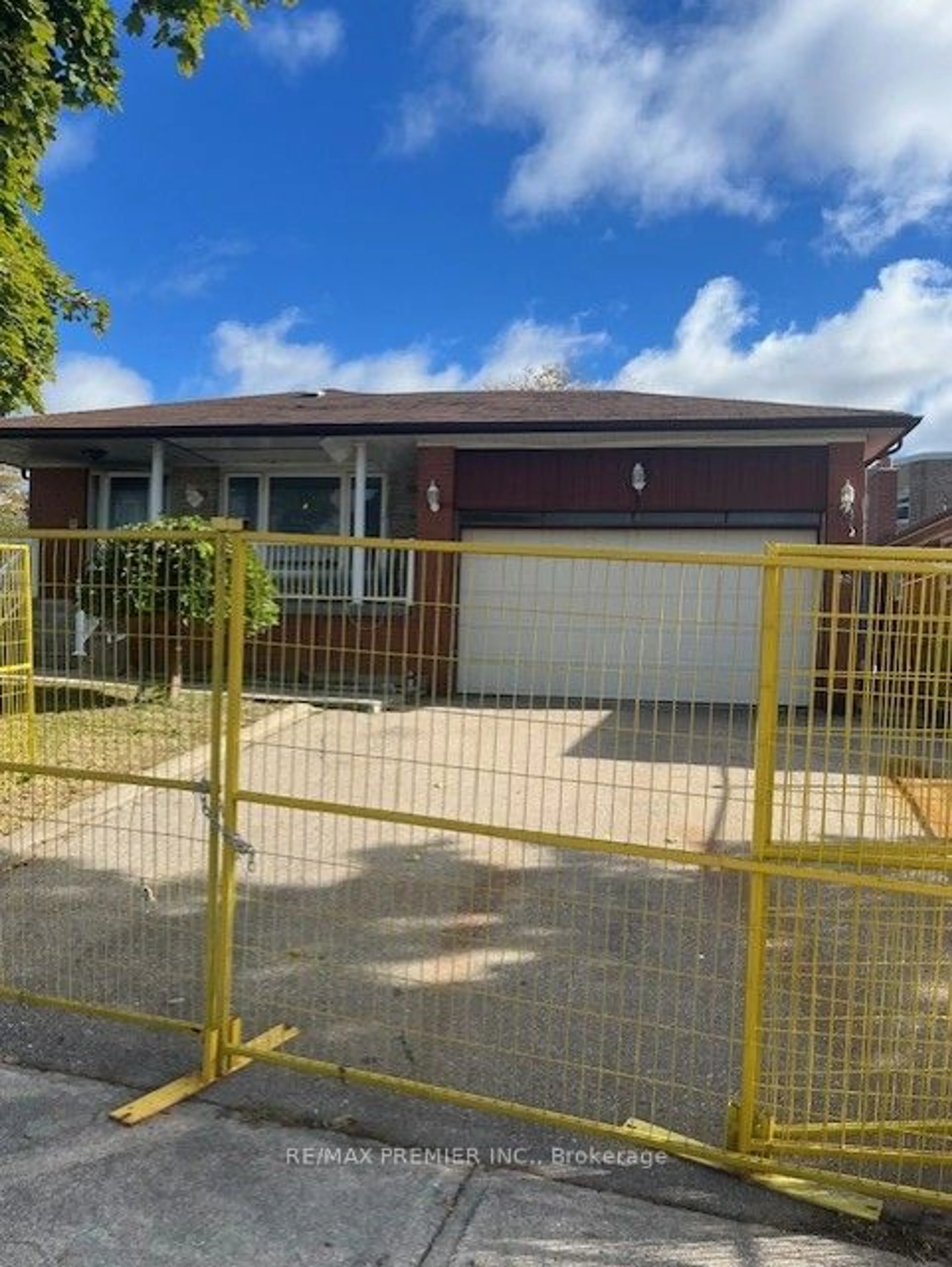 Frontside or backside of a home, the fenced backyard for 21 Mayberry Rd, Toronto Ontario M3N 2A5