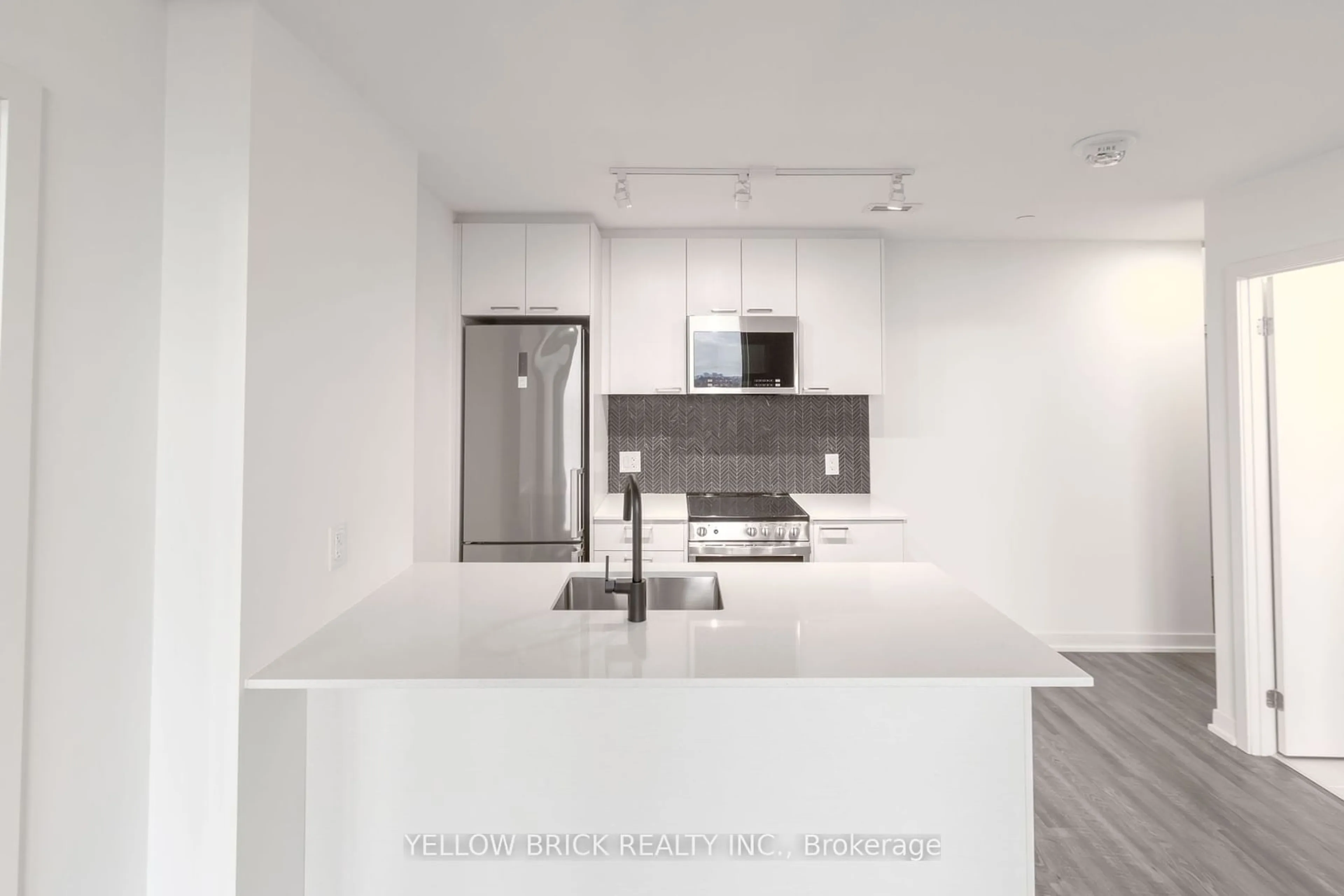 Open concept kitchen for 1808 St. Clair Ave #716, Toronto Ontario M6N 0C1