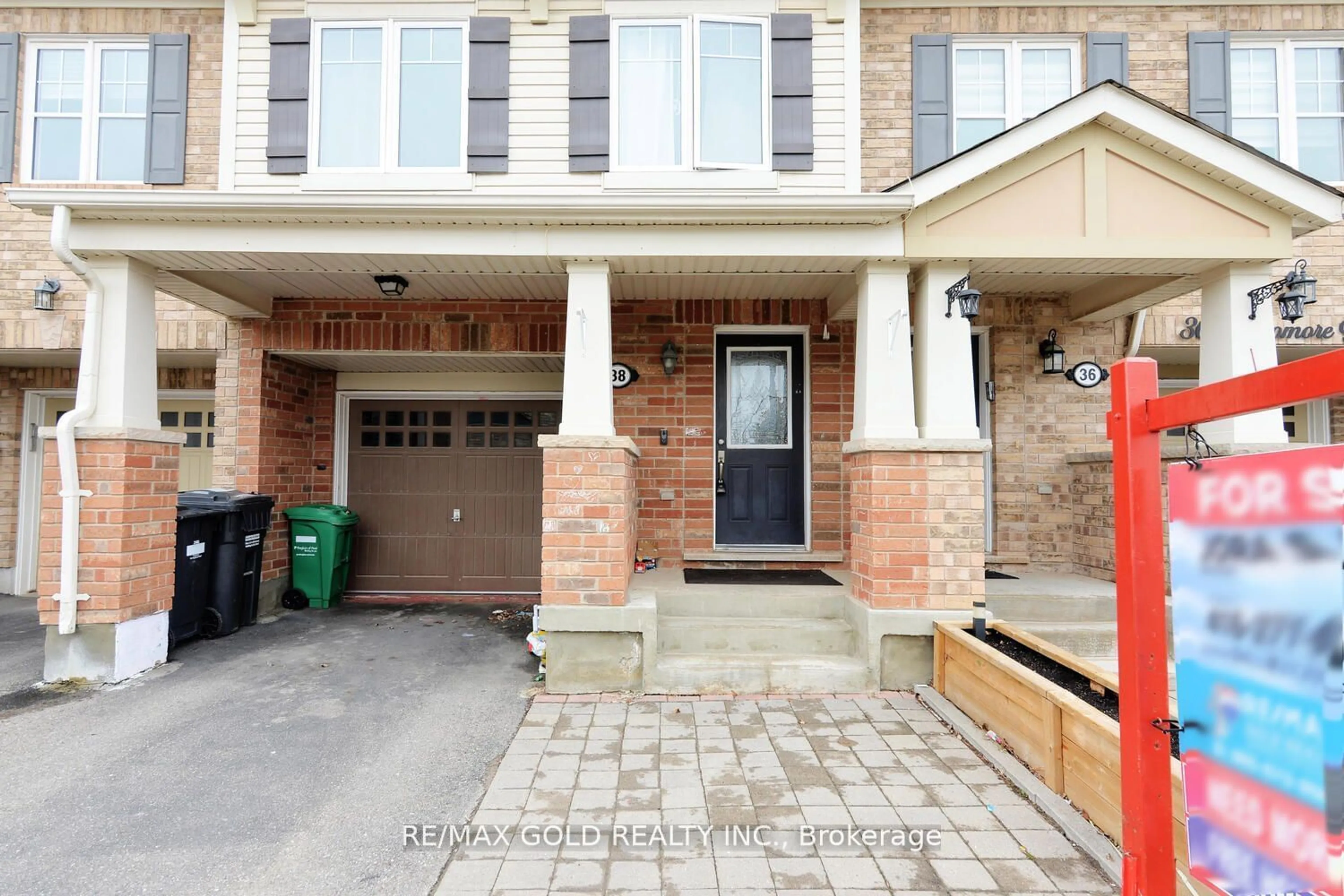 Home with brick exterior material for 38 Donomore Dr, Brampton Ontario L7A 0S7