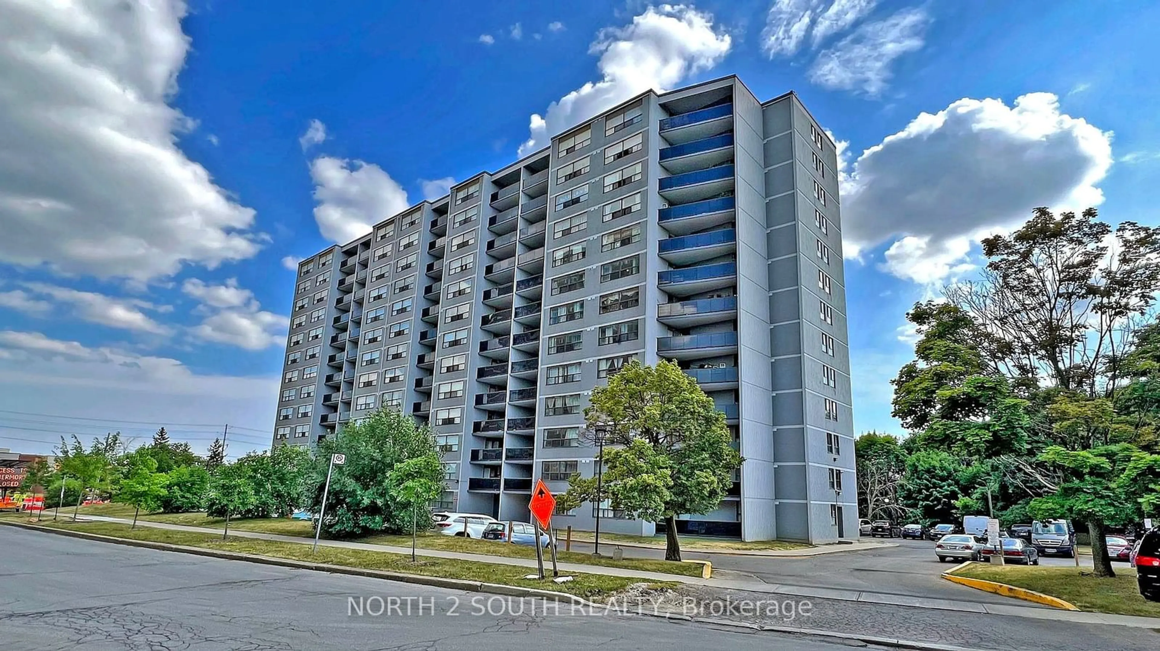 A pic from exterior of the house or condo, the street view for 10 Tobermory Dr #1206, Toronto Ontario M3N 2Y5