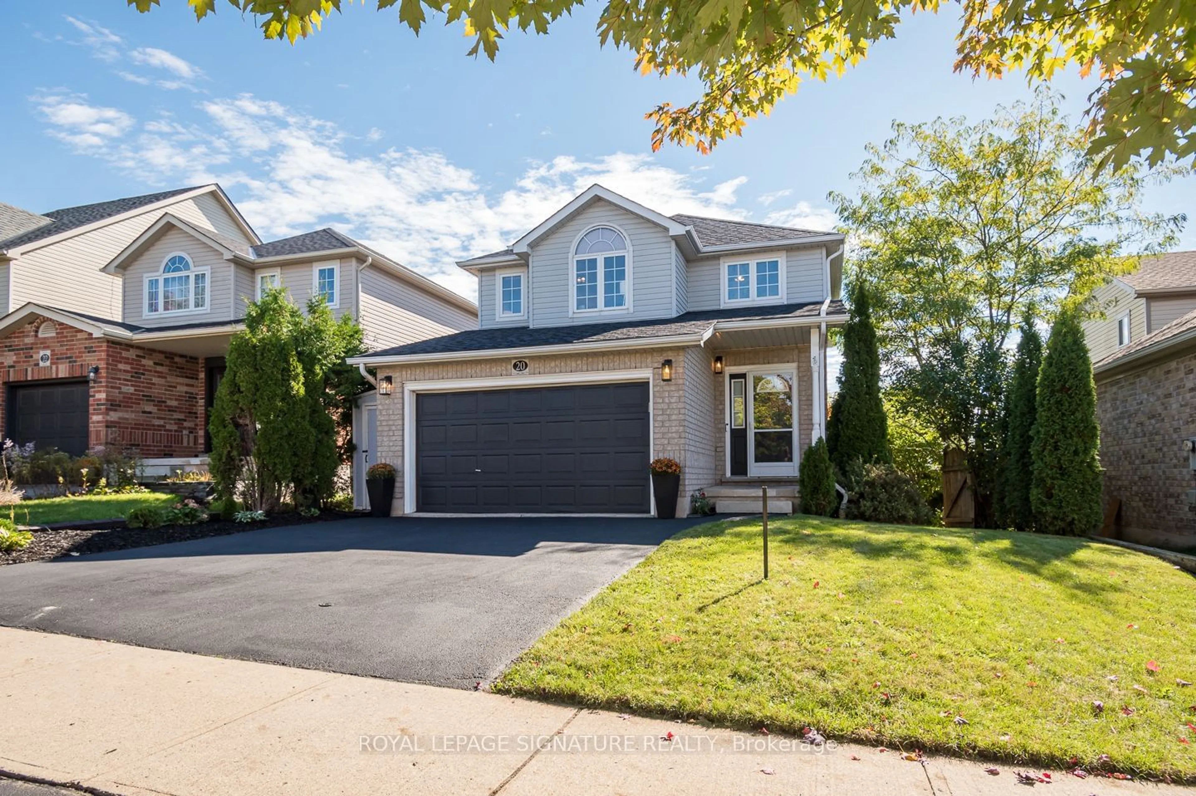 Frontside or backside of a home, the street view for 20 Rachlin Dr, Halton Hills Ontario L7J 3B2