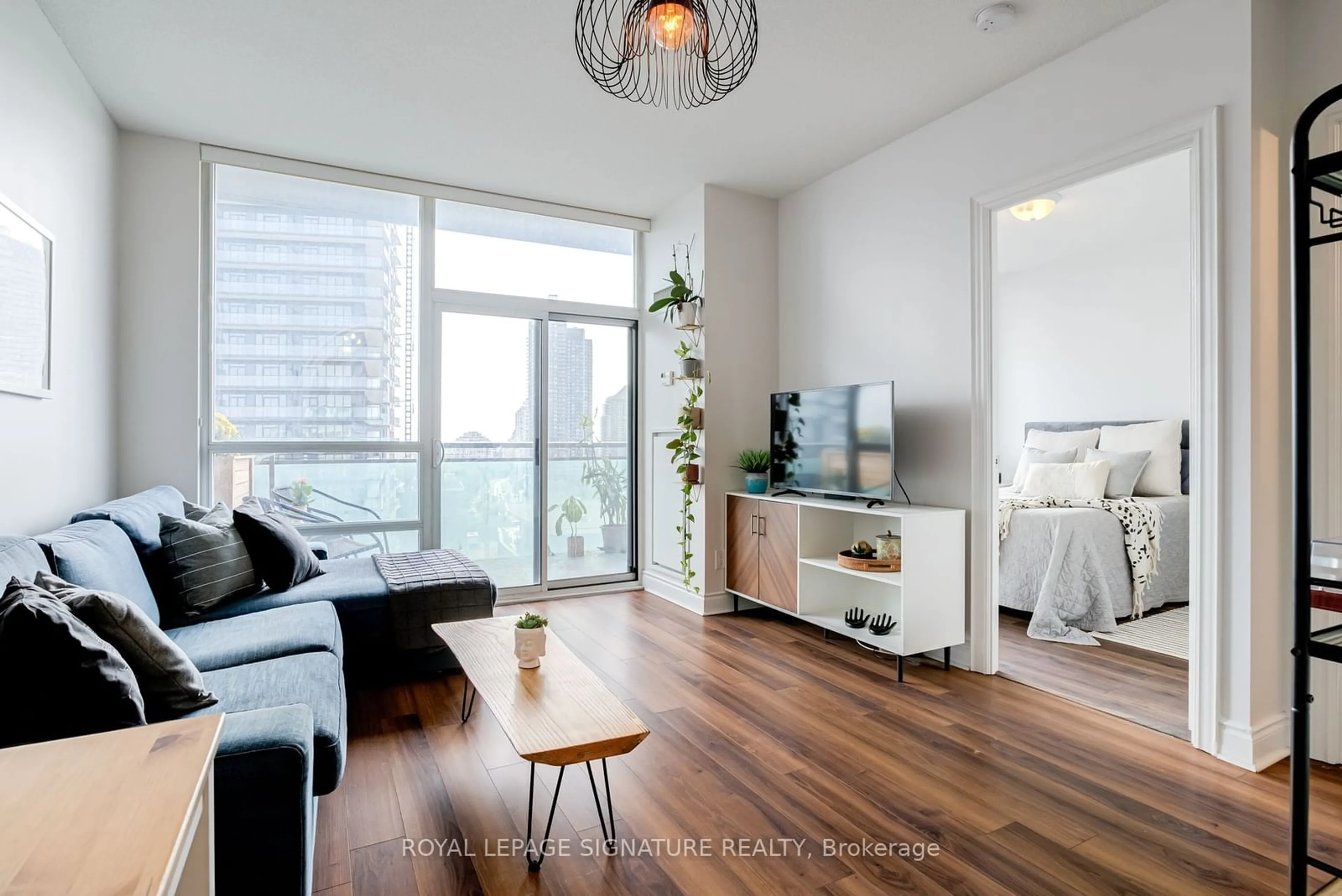 Living room, wood floors for 16 Brookers Lane #1213, Toronto Ontario M8V 0A5