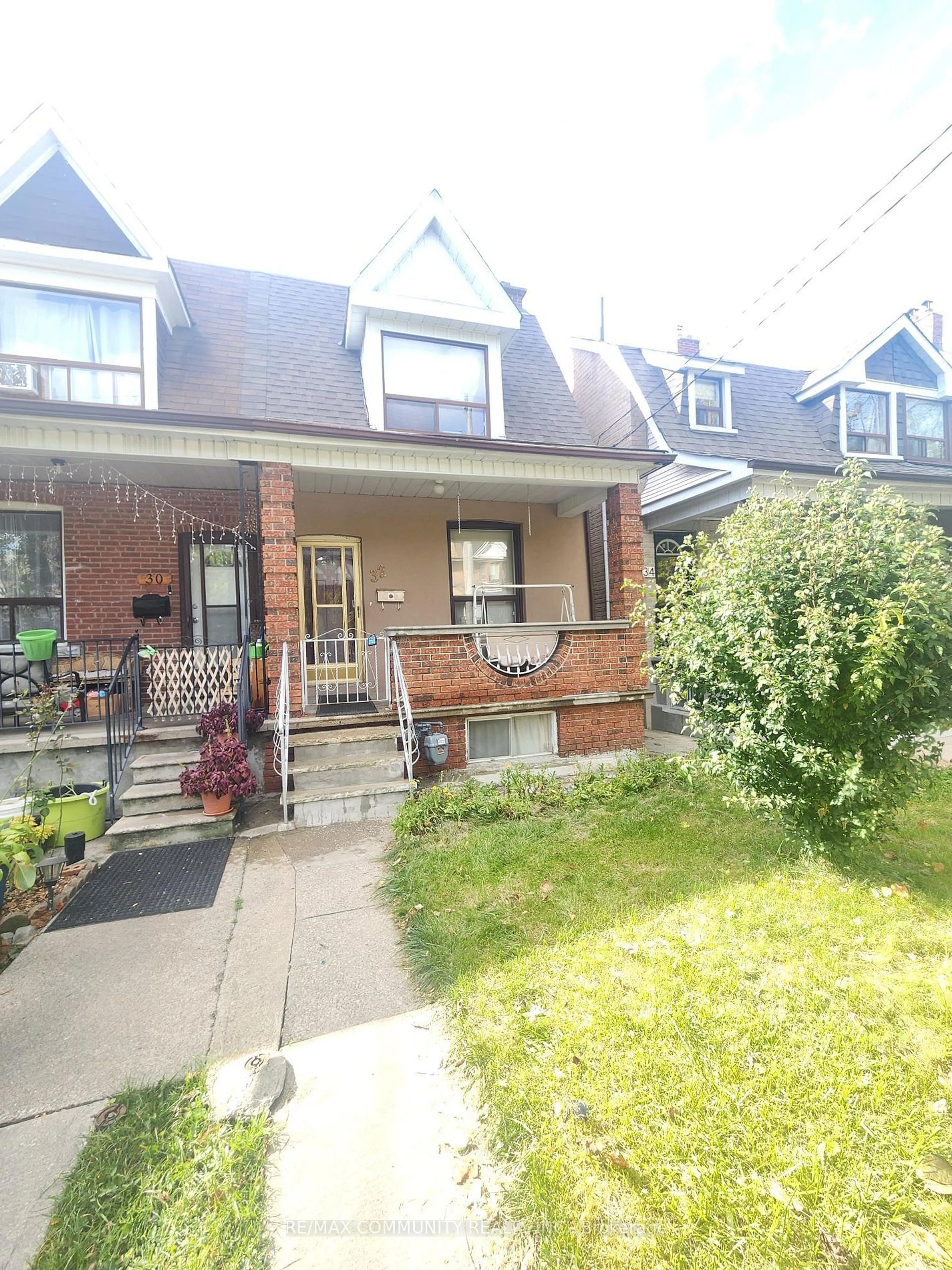 Frontside or backside of a home, the street view for 32 Harvie Ave, Toronto Ontario M6E 4K3