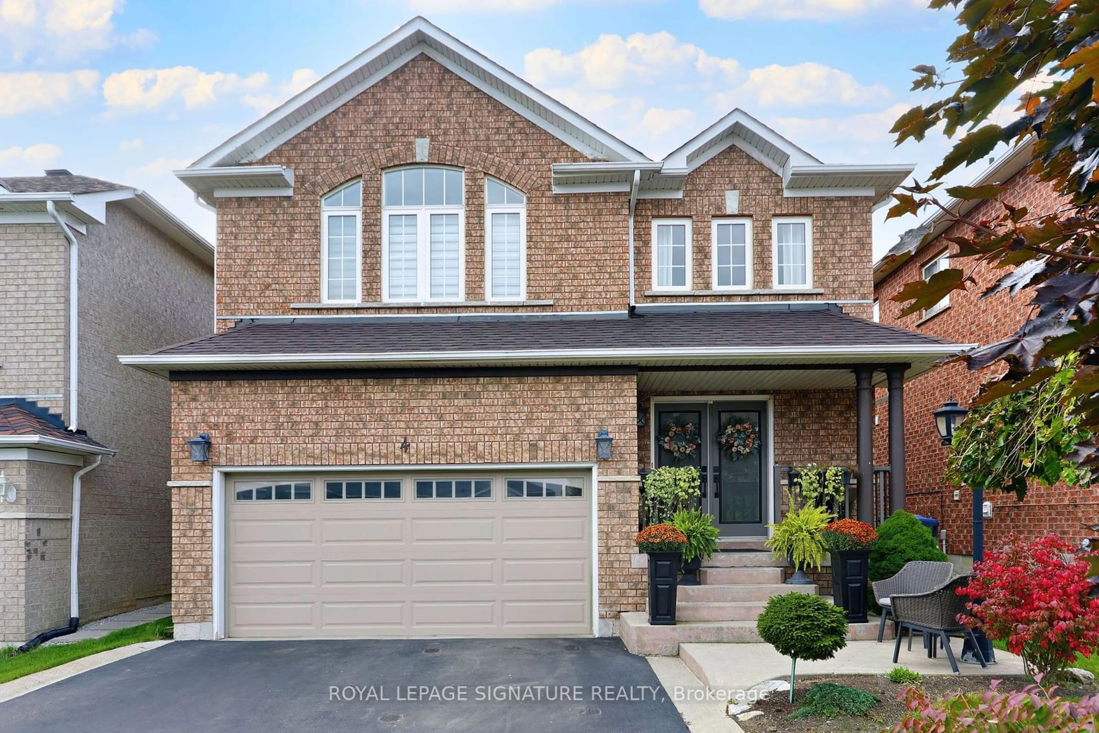 Home with brick exterior material for 4 Wandering Trail Dr, Brampton Ontario L7A 1V2