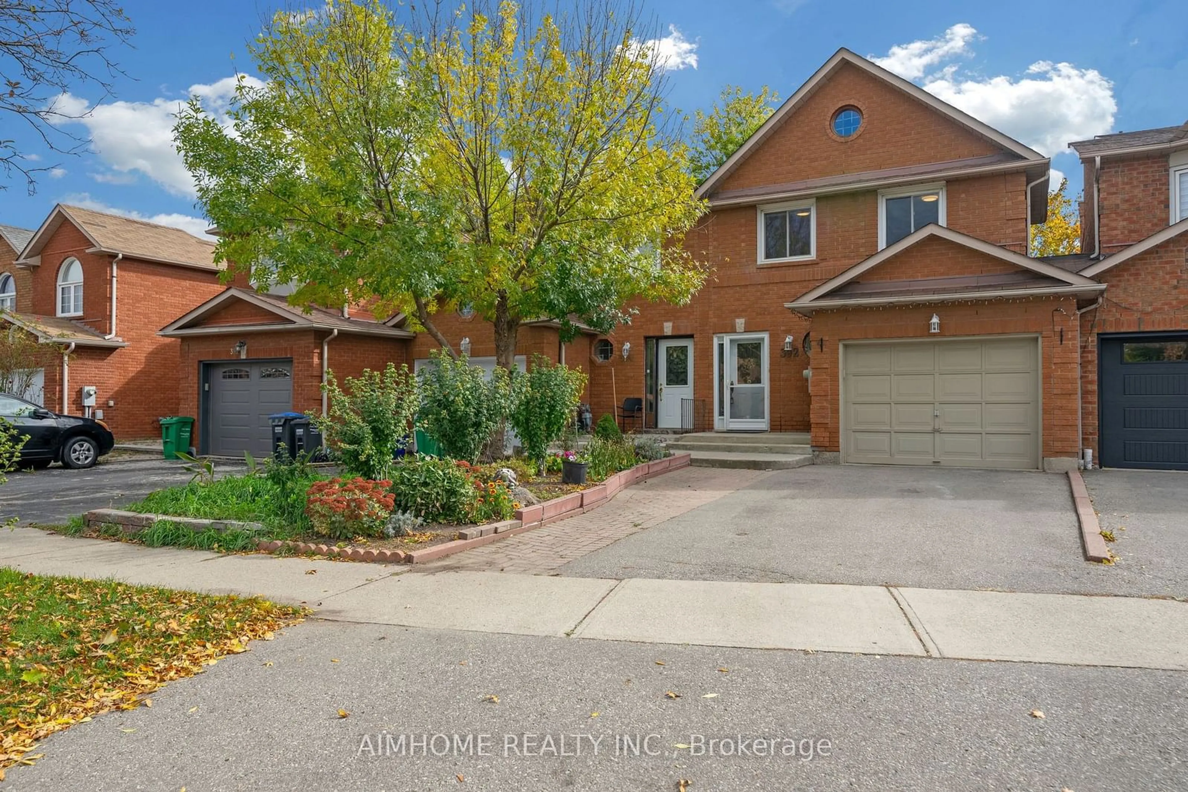 A pic from exterior of the house or condo, the fenced backyard for 392 Wendron Cres, Mississauga Ontario L5R 3H3