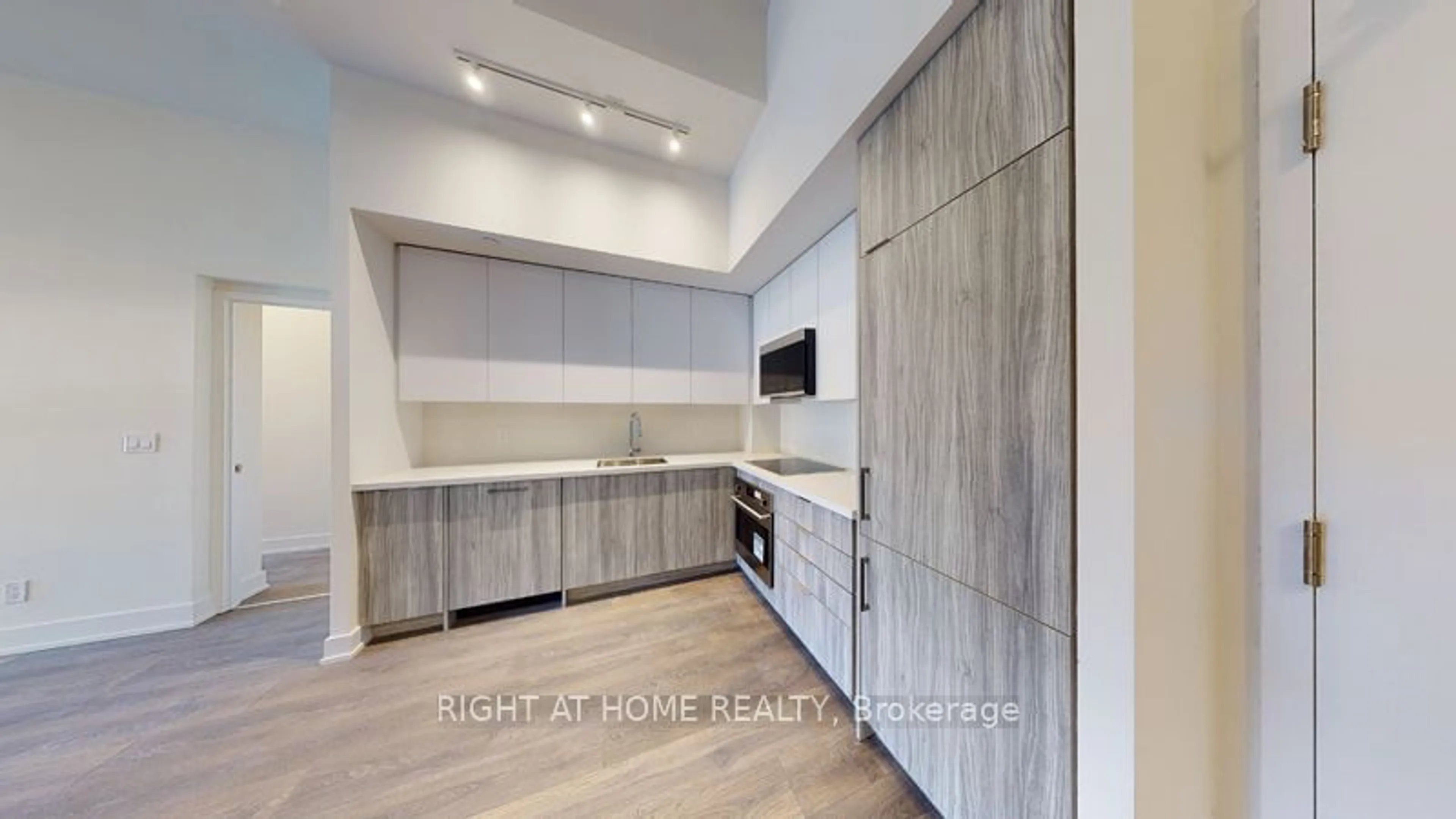 Open concept kitchen for 297 Oak Walk Dr #406, Oakville Ontario L6H 6Z3