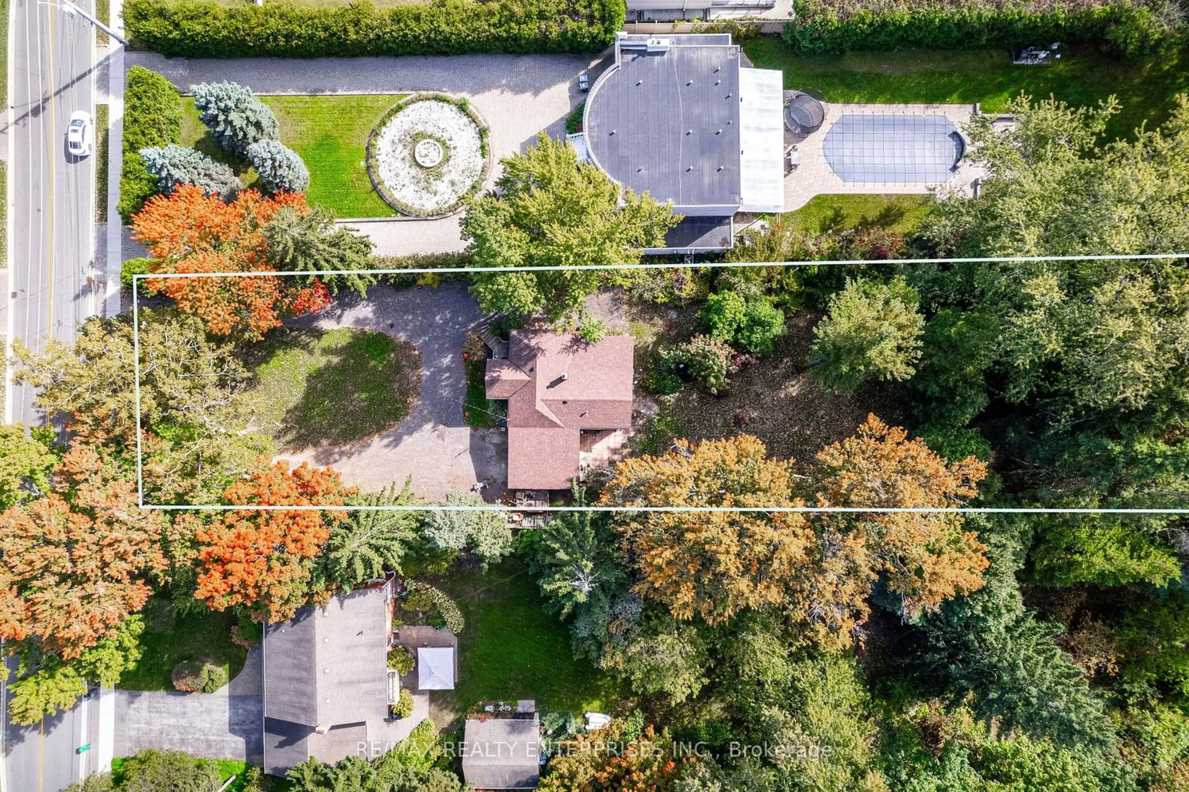 Frontside or backside of a home, the fenced backyard for 1426 Indian Grve, Mississauga Ontario L5H 2S6