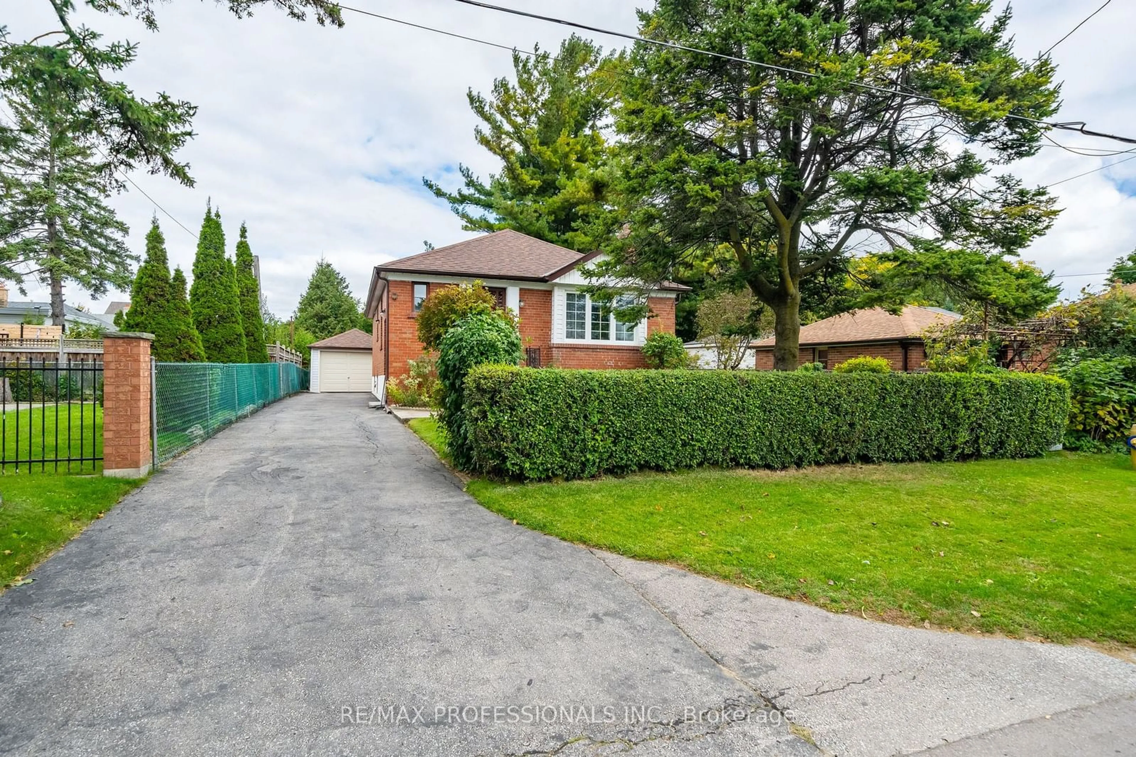 Frontside or backside of a home, the street view for 312 Dalesford Rd, Toronto Ontario M8Y 1G7