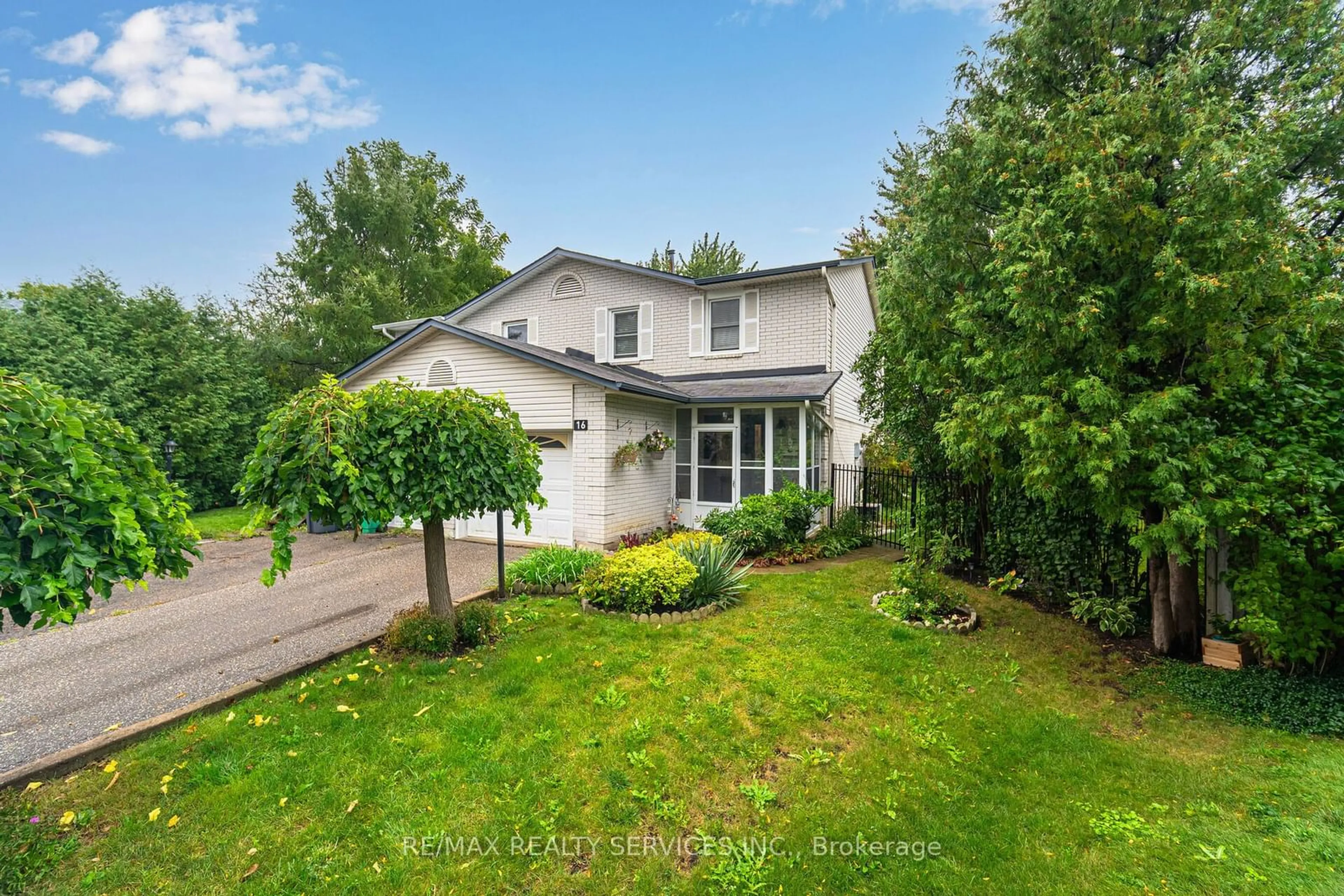 Frontside or backside of a home, the fenced backyard for 16 Montrose Pl, Brampton Ontario L6S 2S8