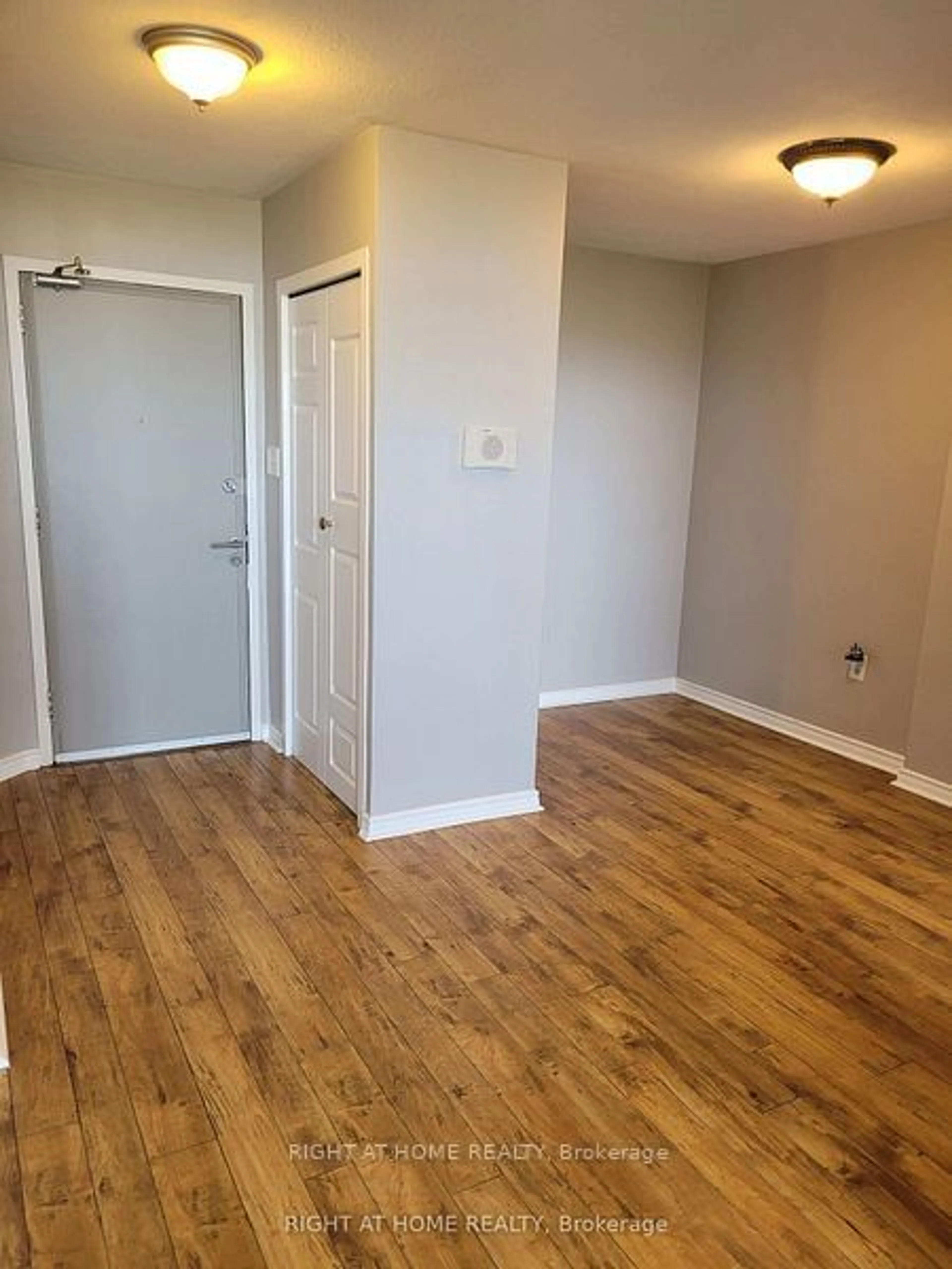 A pic of a room, wood floors for 235 Grandravine Dr #1706, Toronto Ontario M3N 1J2