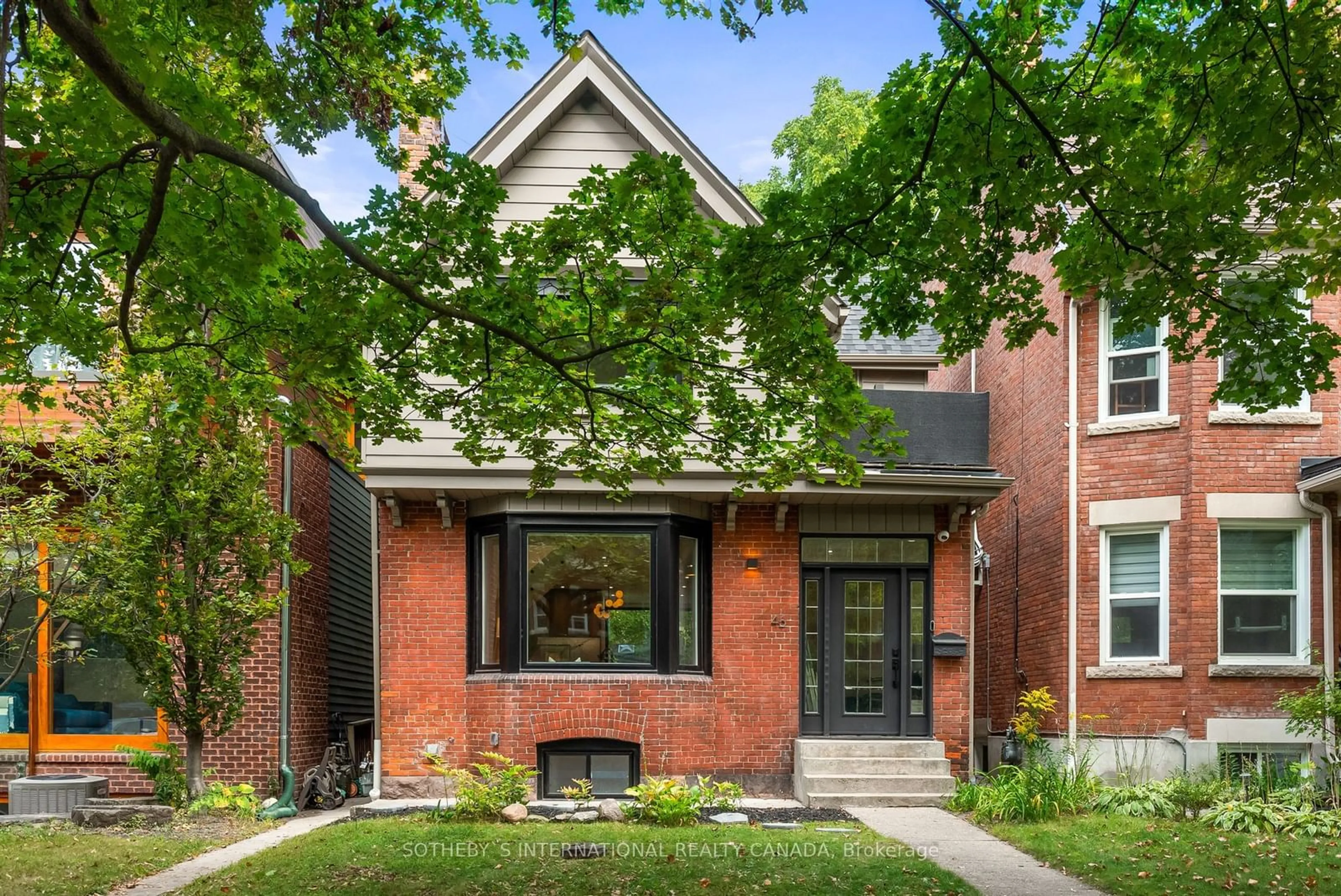 Home with brick exterior material for 46 Hewitt Ave, Toronto Ontario M6R 1Y3