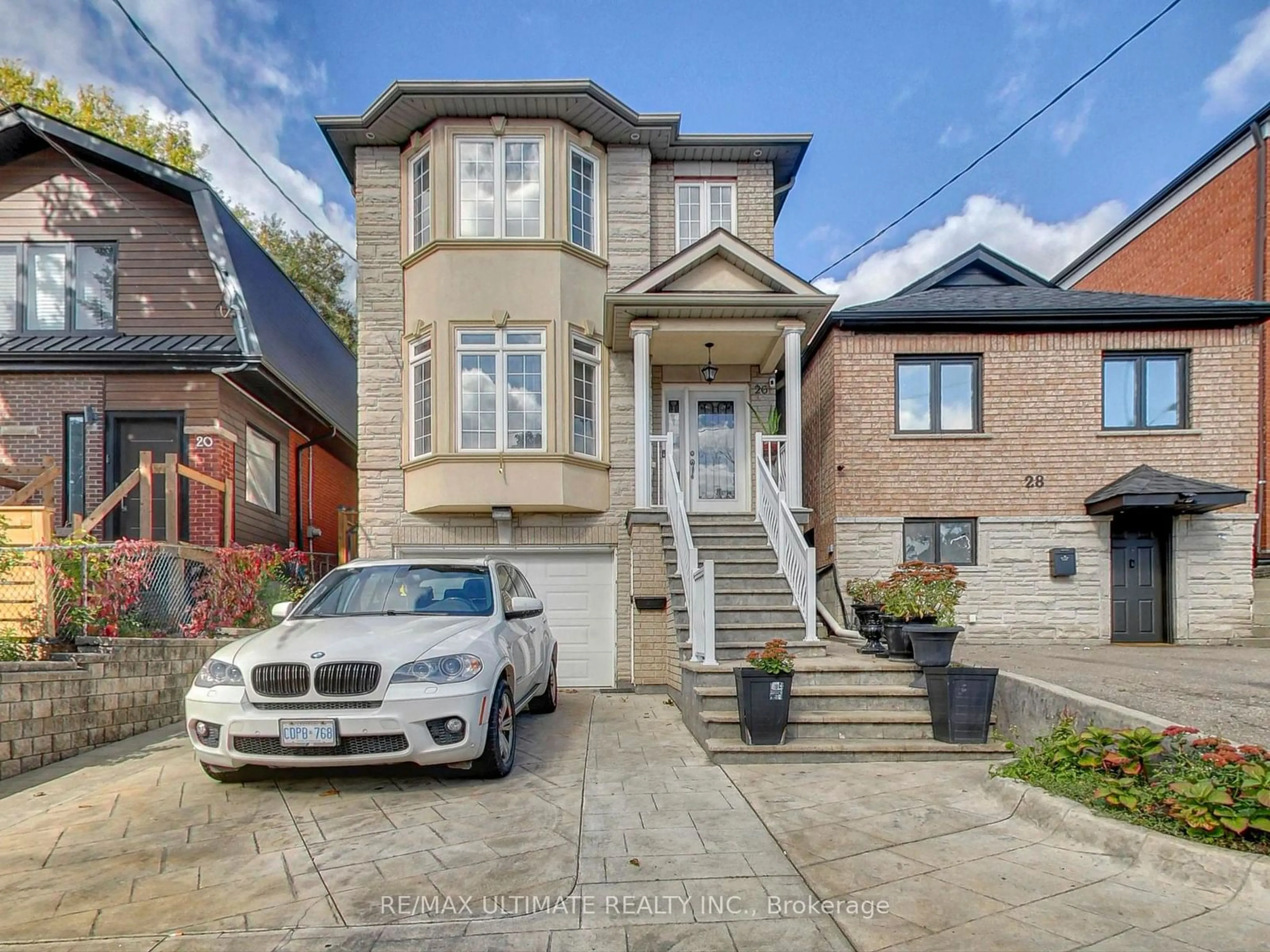 Frontside or backside of a home, the street view for 26 Dynevor Rd, Toronto Ontario M6E 3X1