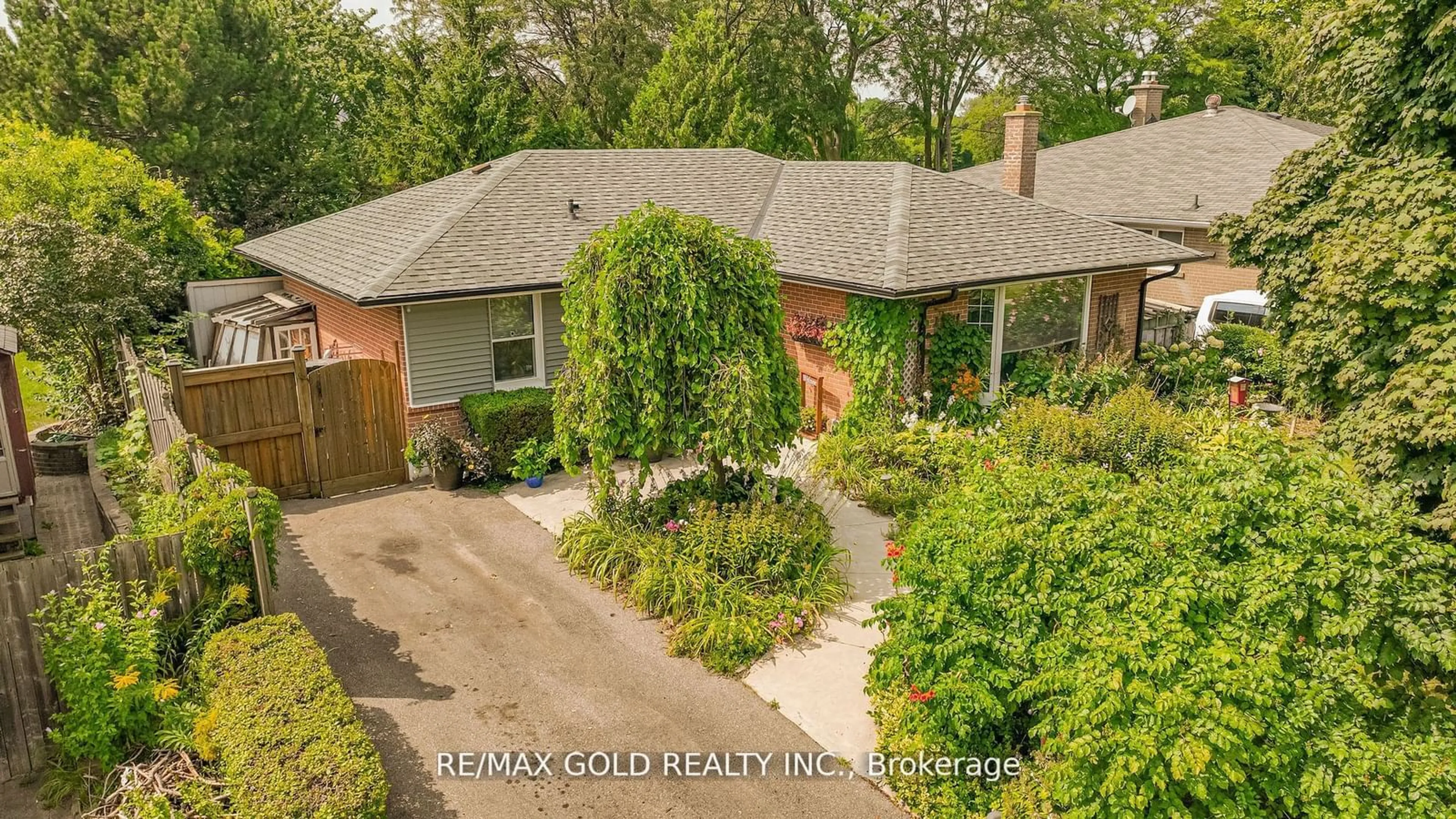 Frontside or backside of a home, the fenced backyard for 241 Avondale Blvd, Brampton Ontario L6T 1J3