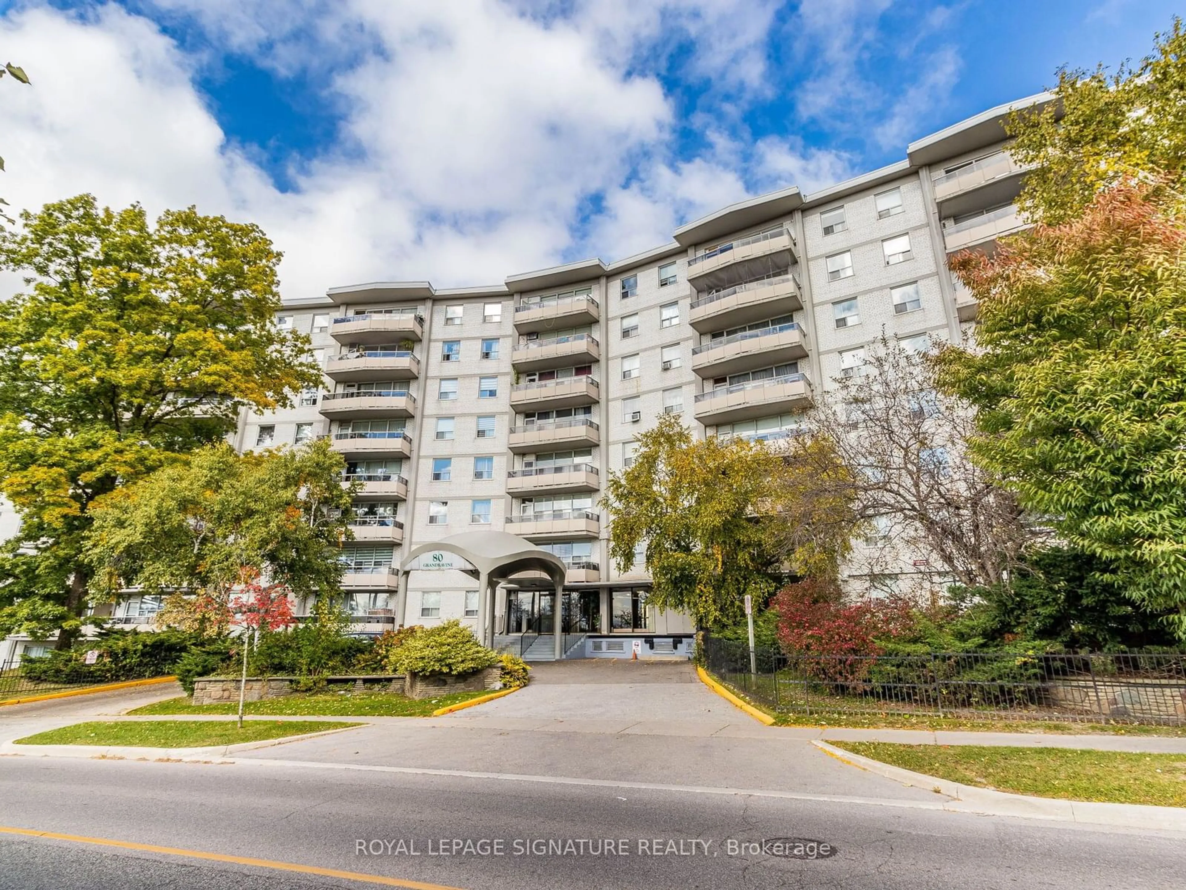 A pic from exterior of the house or condo, the street view for 80 Grandravine Dr #706, Toronto Ontario M3J 1B2