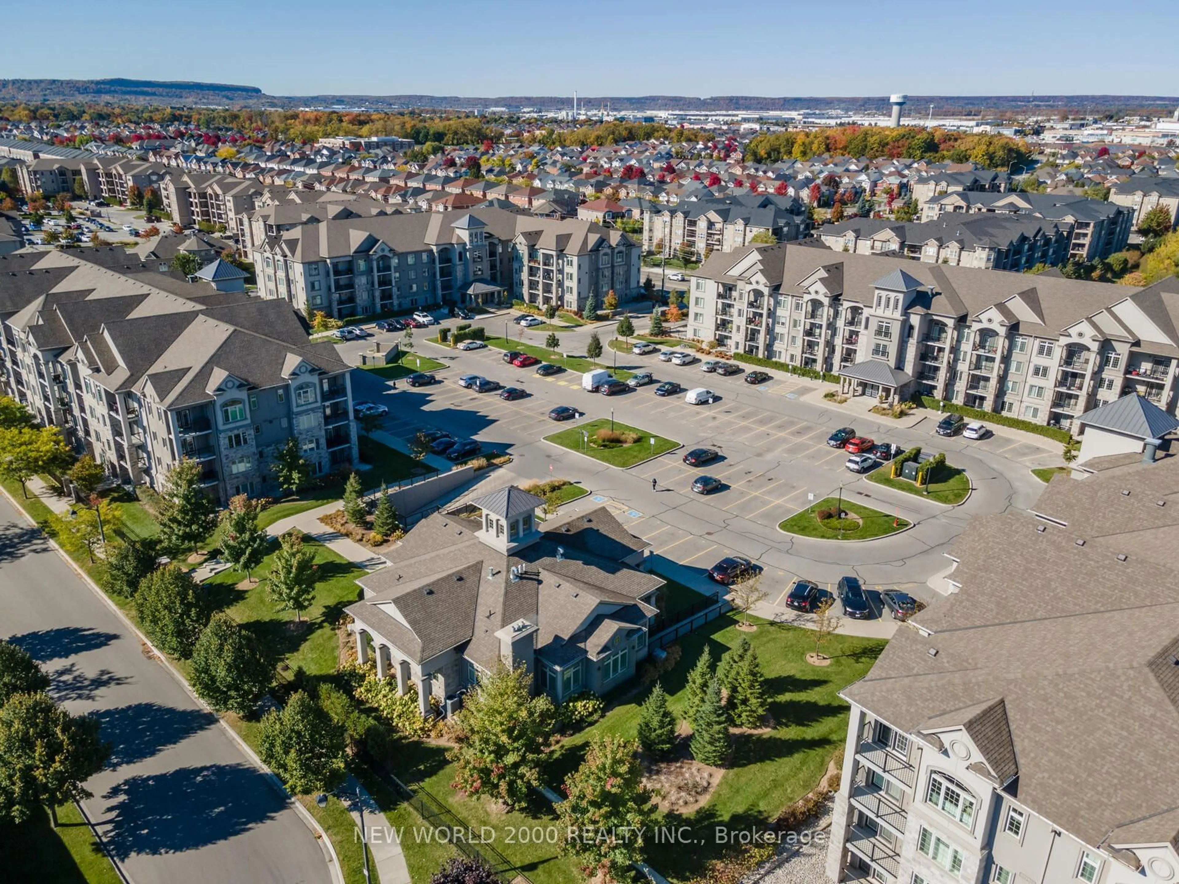 A pic from exterior of the house or condo, the view of city buildings for 1440 Main St #307, Milton Ontario L9T 8W3