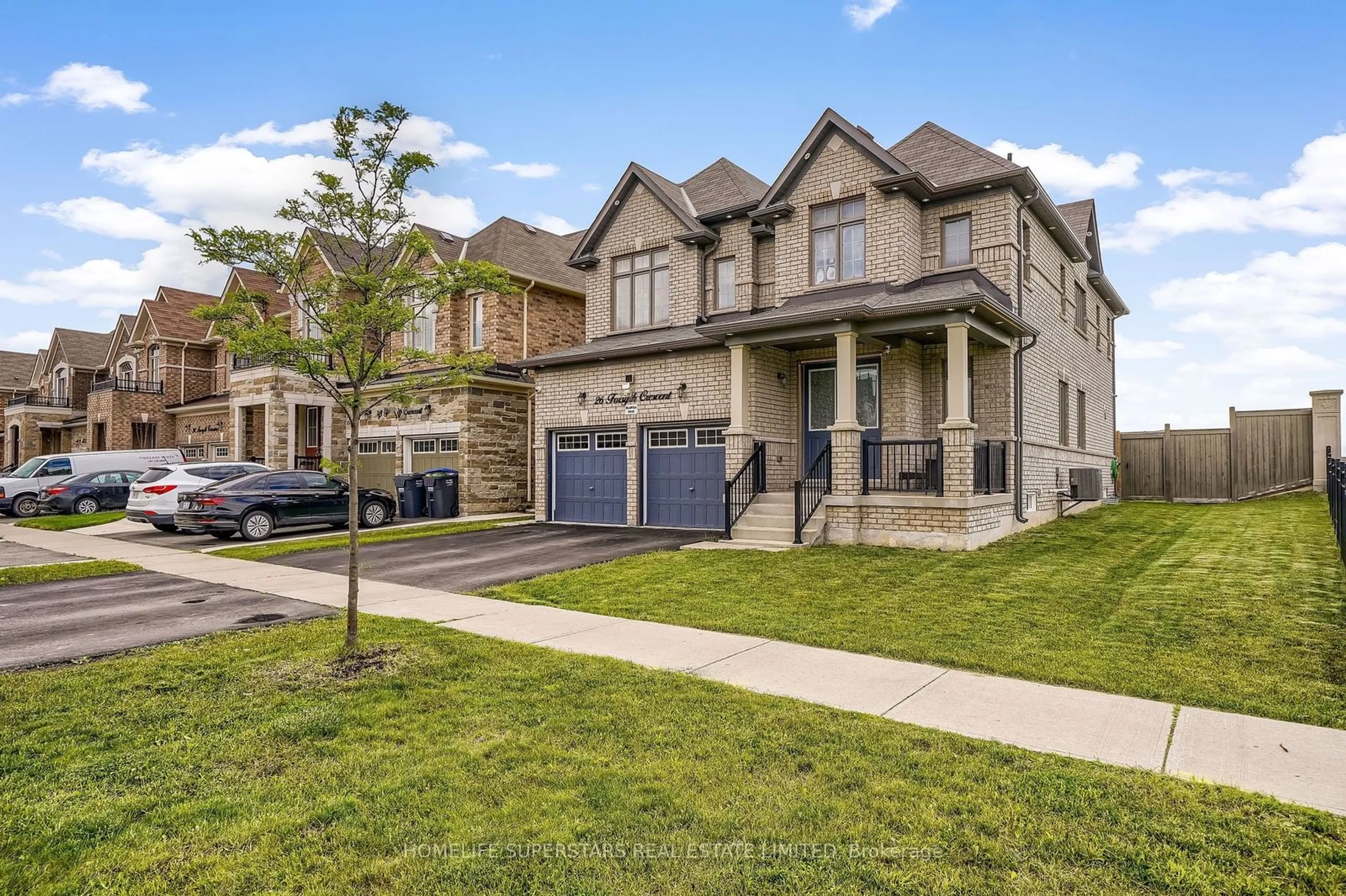 Frontside or backside of a home, the street view for 26 Forsyth Cres, Brampton Ontario L6X 5N3