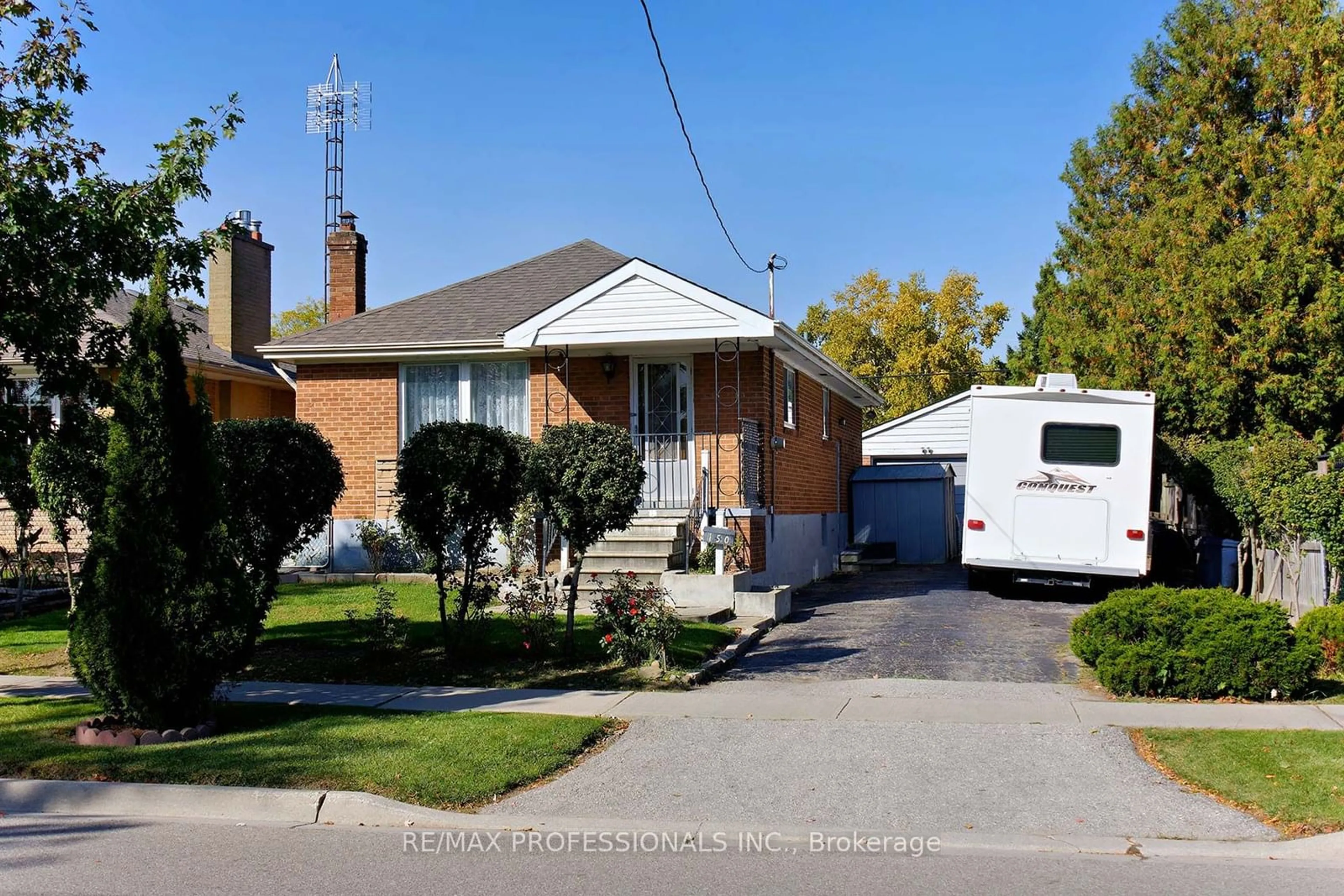 Frontside or backside of a home, the street view for 150 Simpson Ave, Toronto Ontario M8Z 1E3