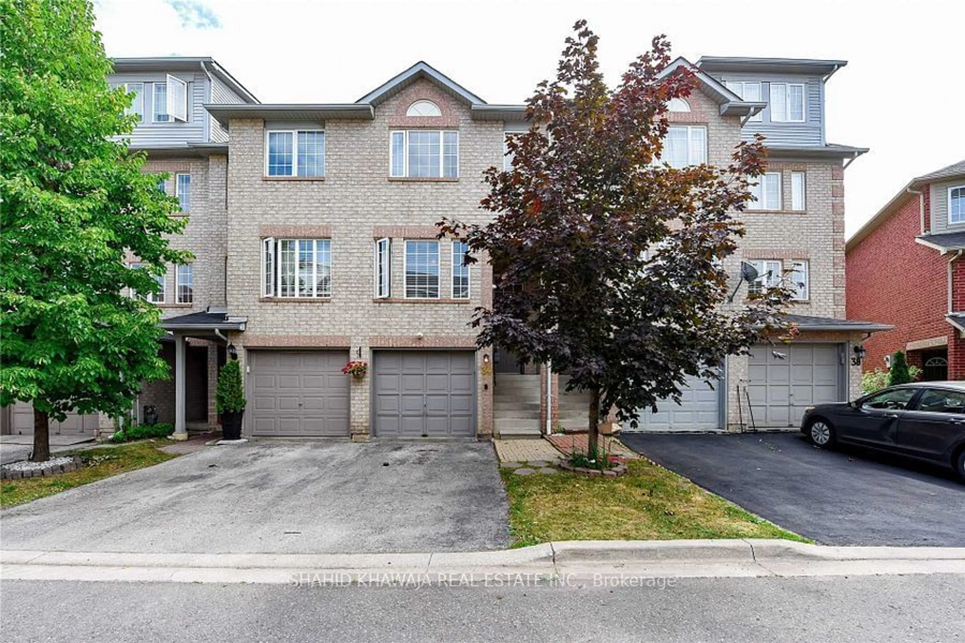 A pic from exterior of the house or condo, the street view for 34 Spadina Rd, Brampton Ontario L6X 4X6