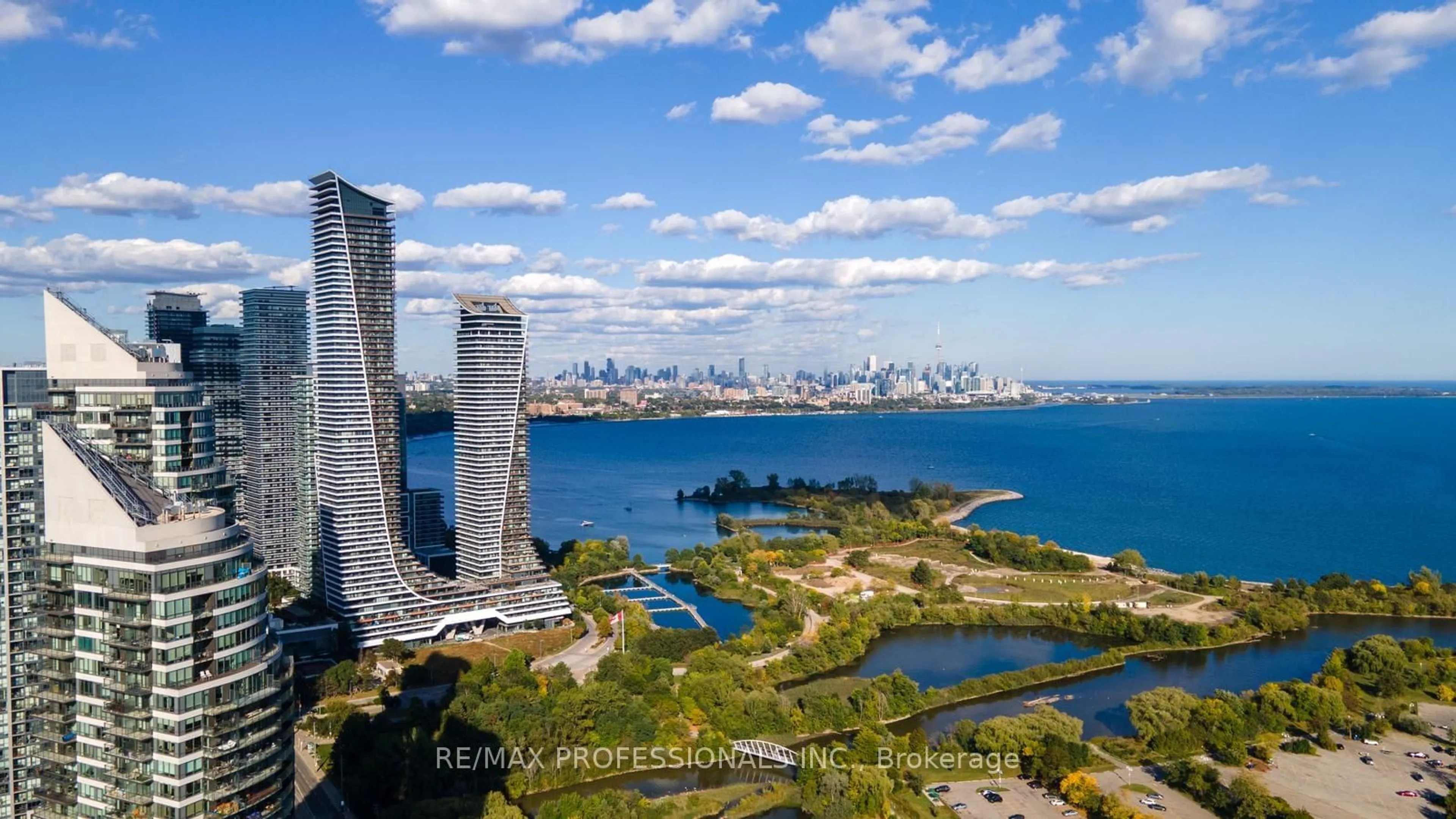 A pic from exterior of the house or condo, the view of city buildings for 30 Shore Breeze Dr #1817, Toronto Ontario M8V 0J1