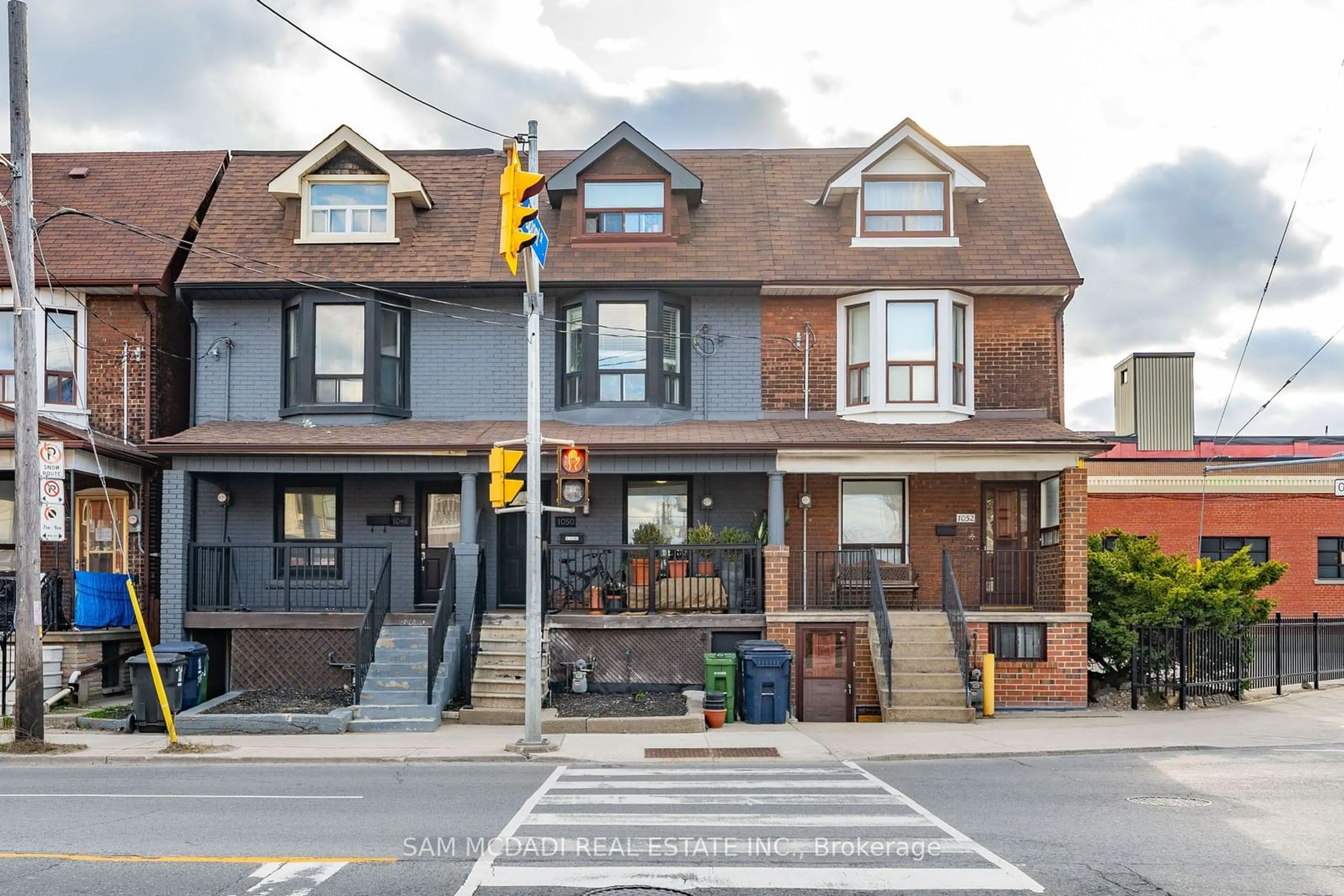 A pic from exterior of the house or condo, the street view for 1050 Ossington Ave, Toronto Ontario M6G 3V6