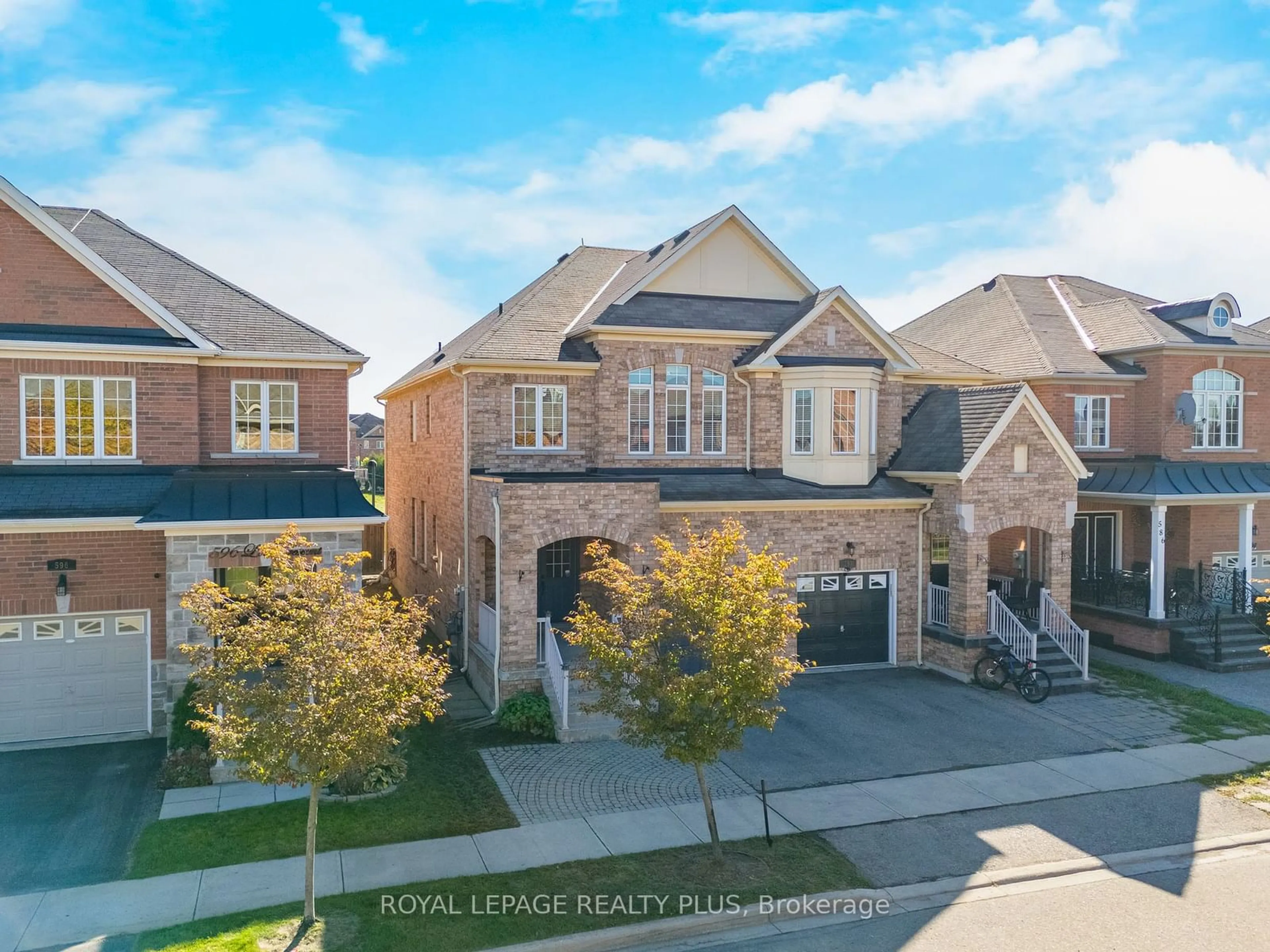 Home with brick exterior material for 592 Lott Cres, Milton Ontario L9T 7P9