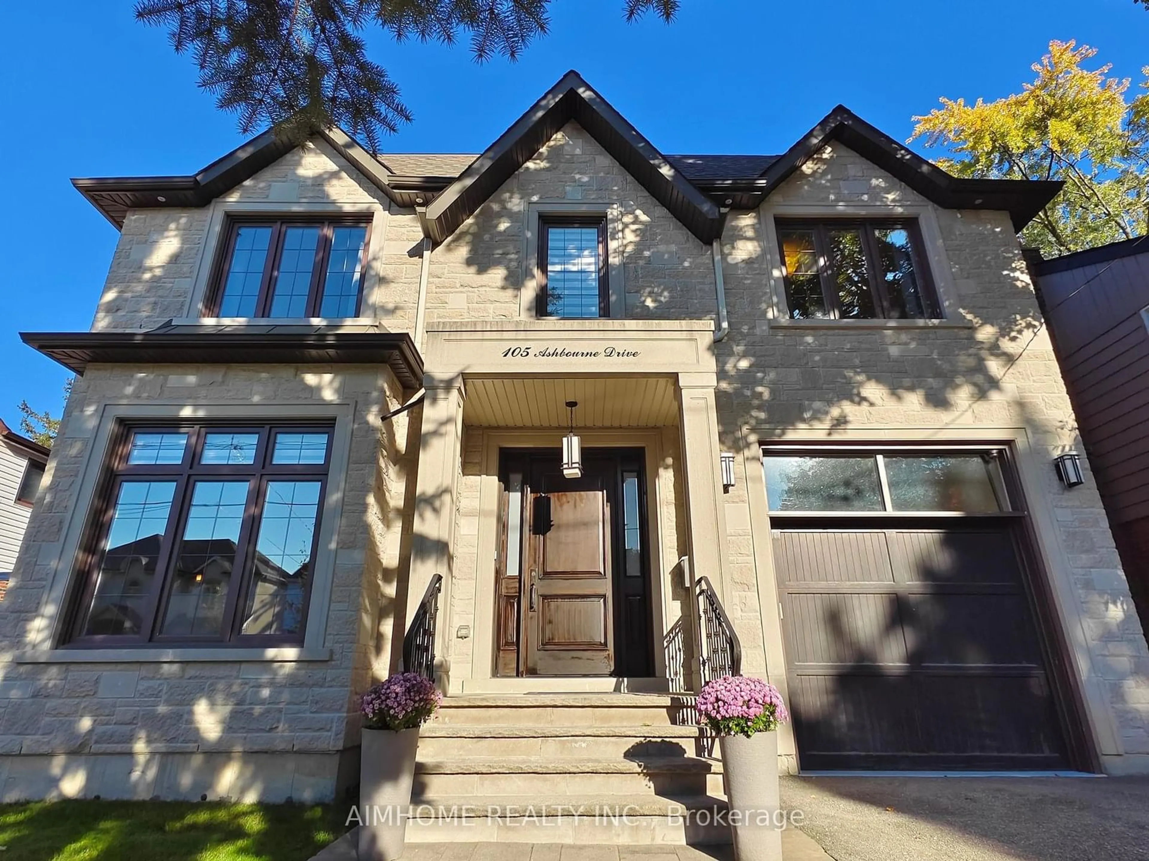 Home with brick exterior material for 105 Ashbourne Dr, Toronto Ontario M9B 4H6