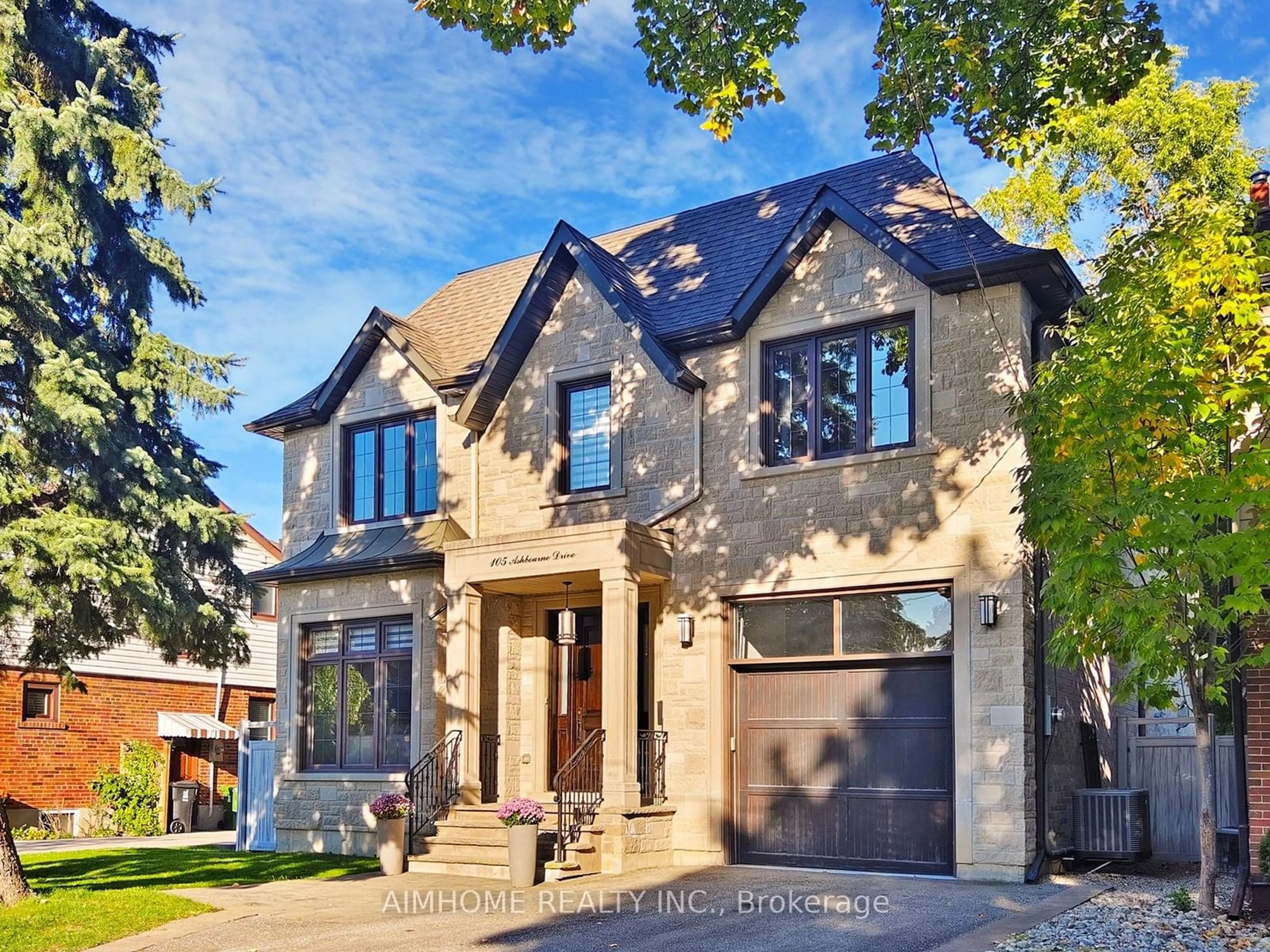 Home with brick exterior material for 105 Ashbourne Dr, Toronto Ontario M9B 4H6