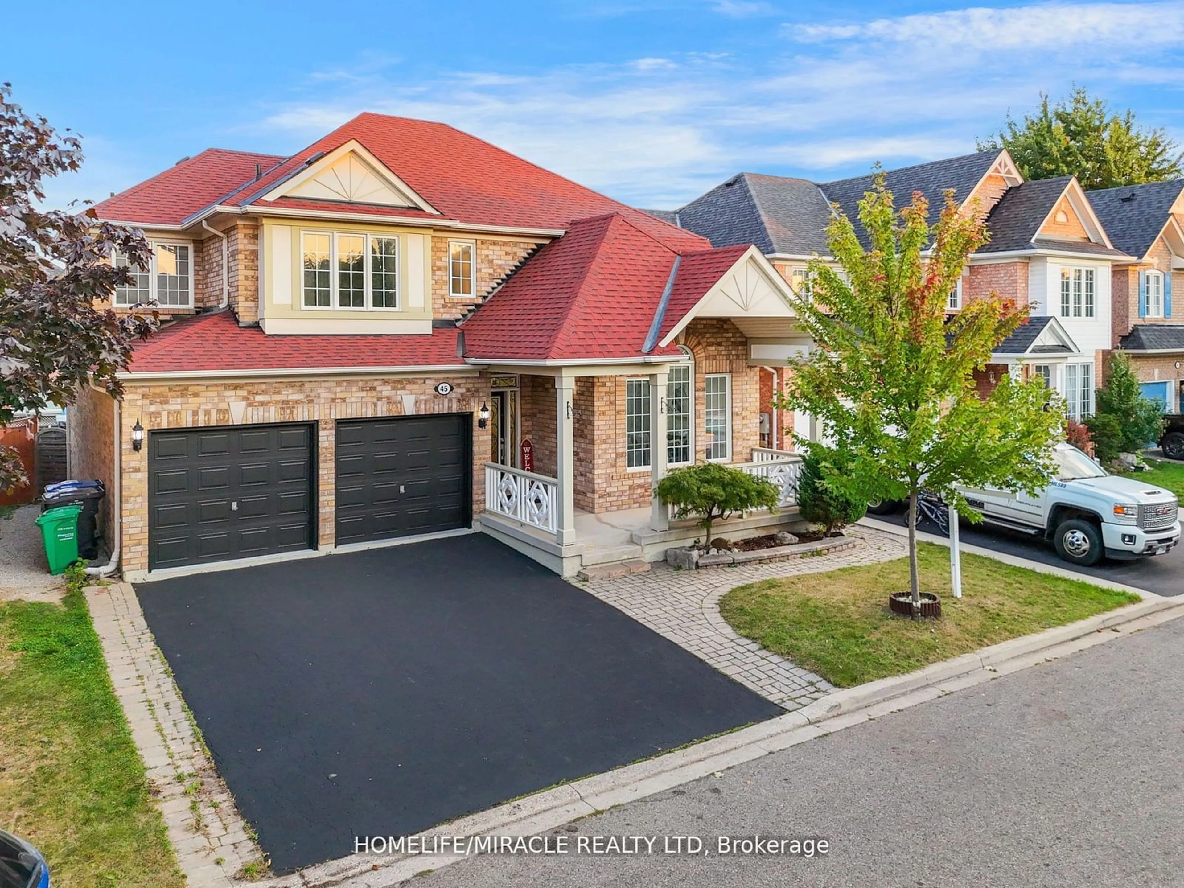 Home with brick exterior material for 45 Williamson Dr, Brampton Ontario L7A 3L9