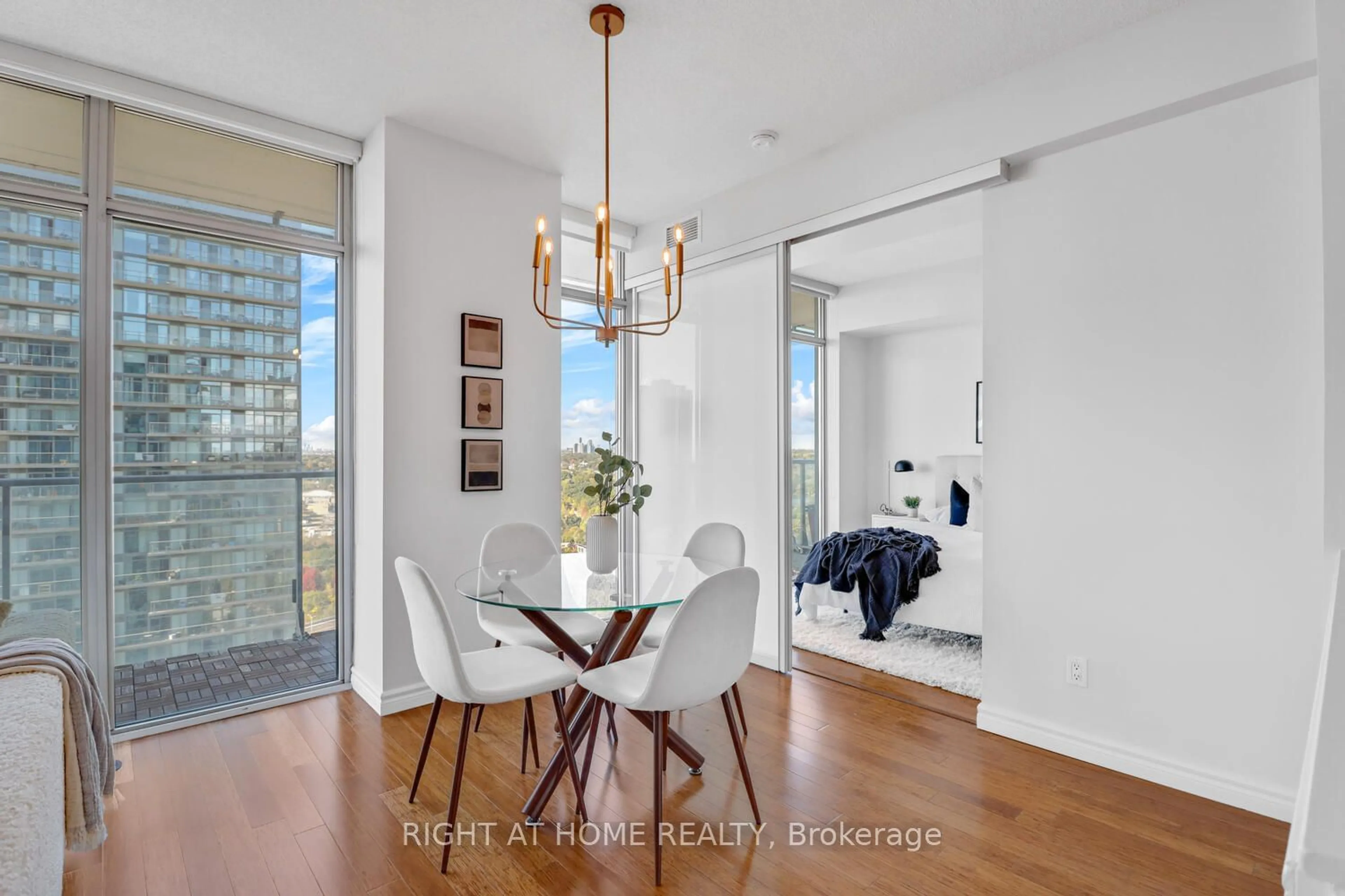 Dining room, wood floors for 103 The Queensway #2410, Toronto Ontario M6S 5B3