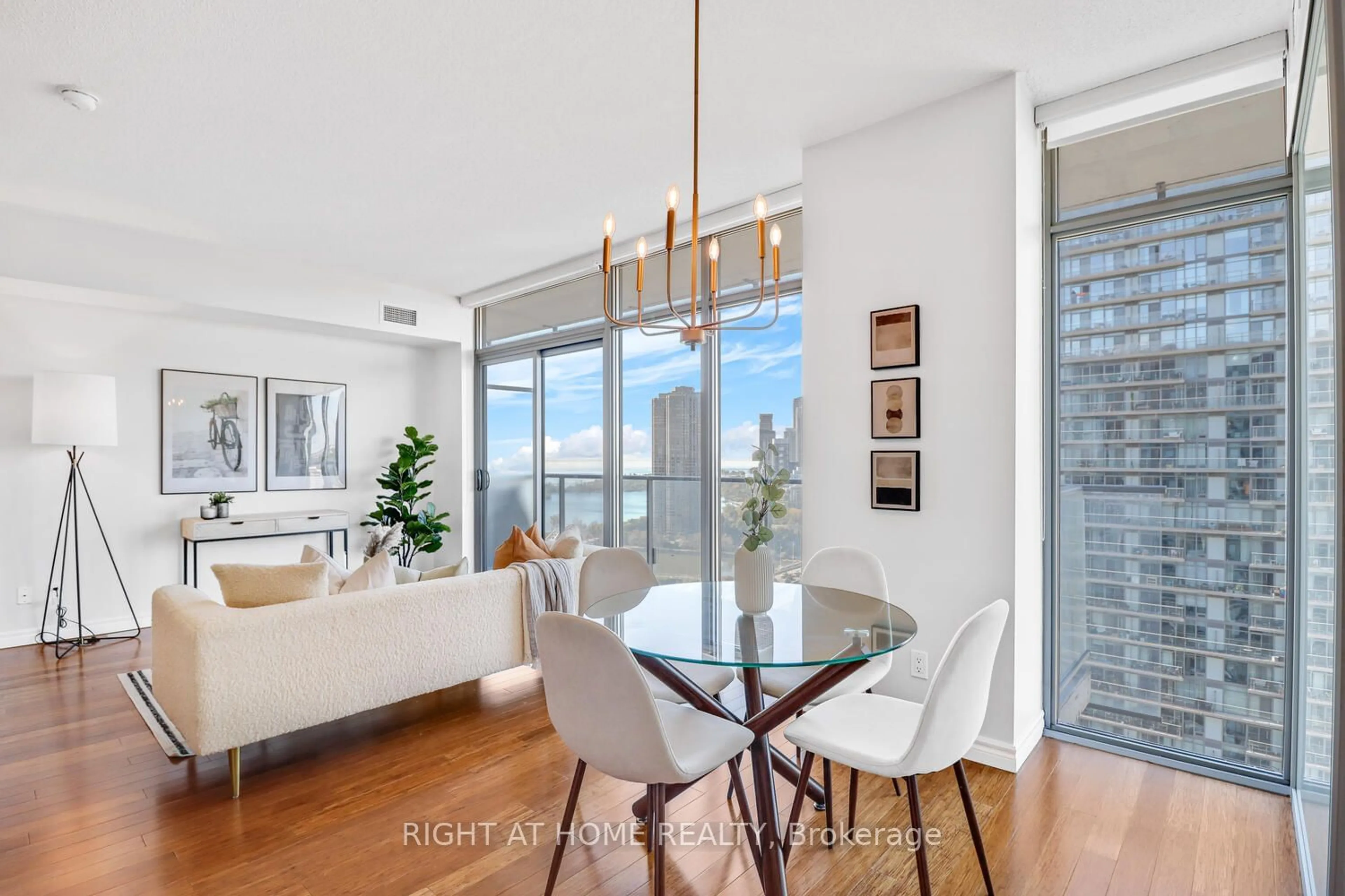 Dining room, wood floors for 103 The Queensway #2410, Toronto Ontario M6S 5B3