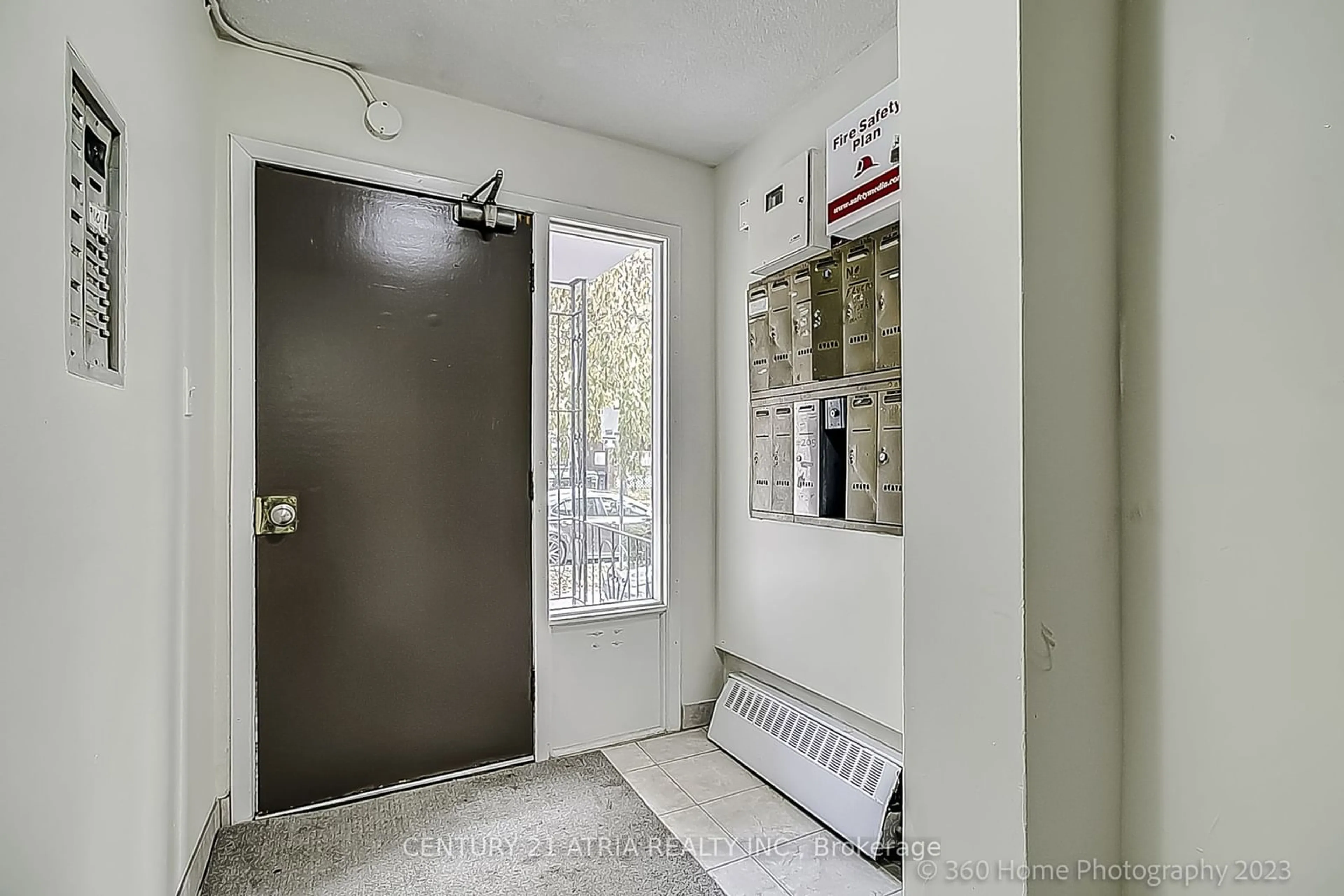 Indoor entryway, cement floor for 30 Lansdowne Ave, Toronto Ontario M6K 2V8