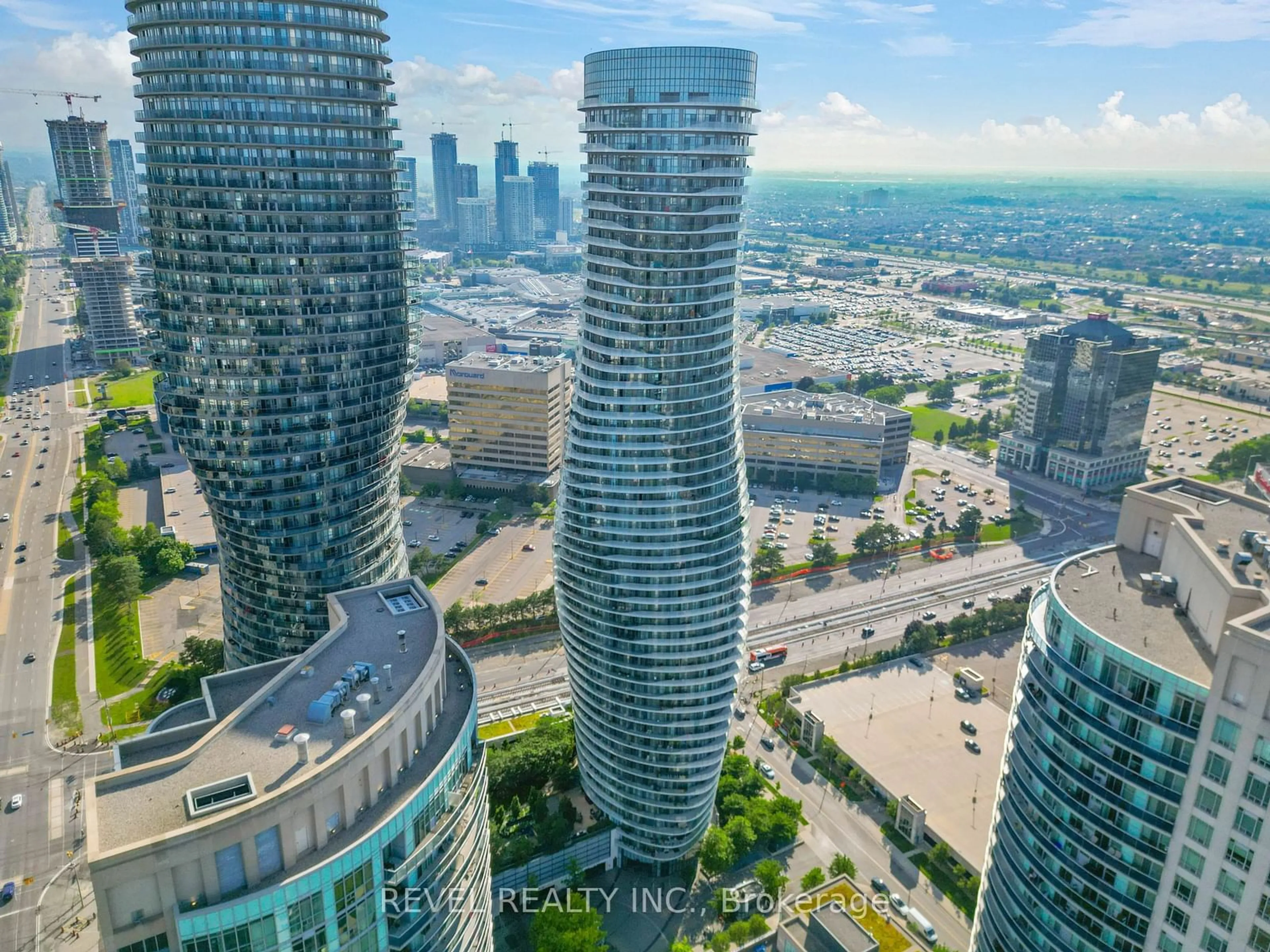 A pic from exterior of the house or condo, the view of city buildings for 50 Absolute Ave #PH3, Mississauga Ontario L4Z 0A8