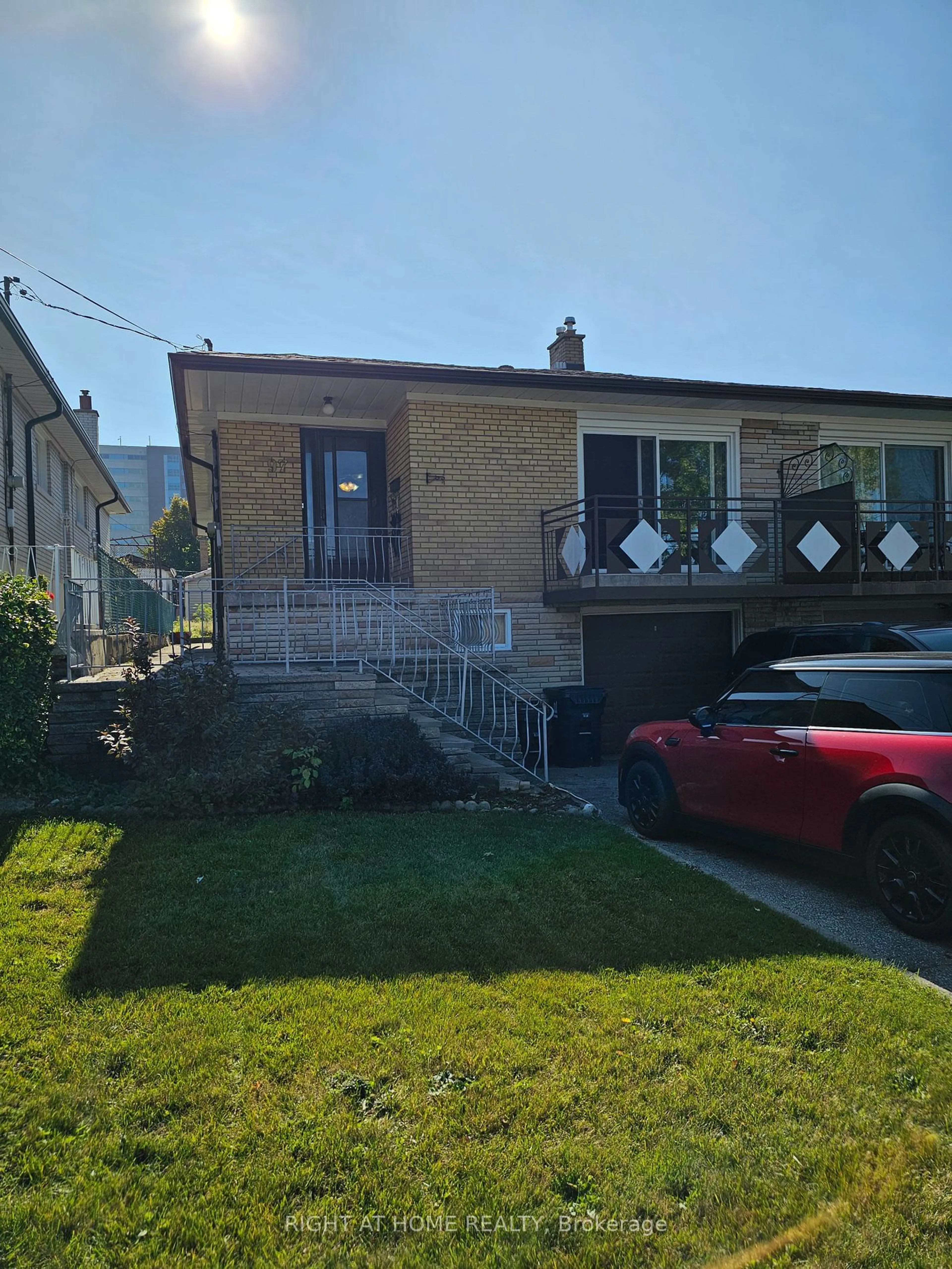 Frontside or backside of a home, the street view for 97 VICTORY Dr, Toronto Ontario M3M 2J9