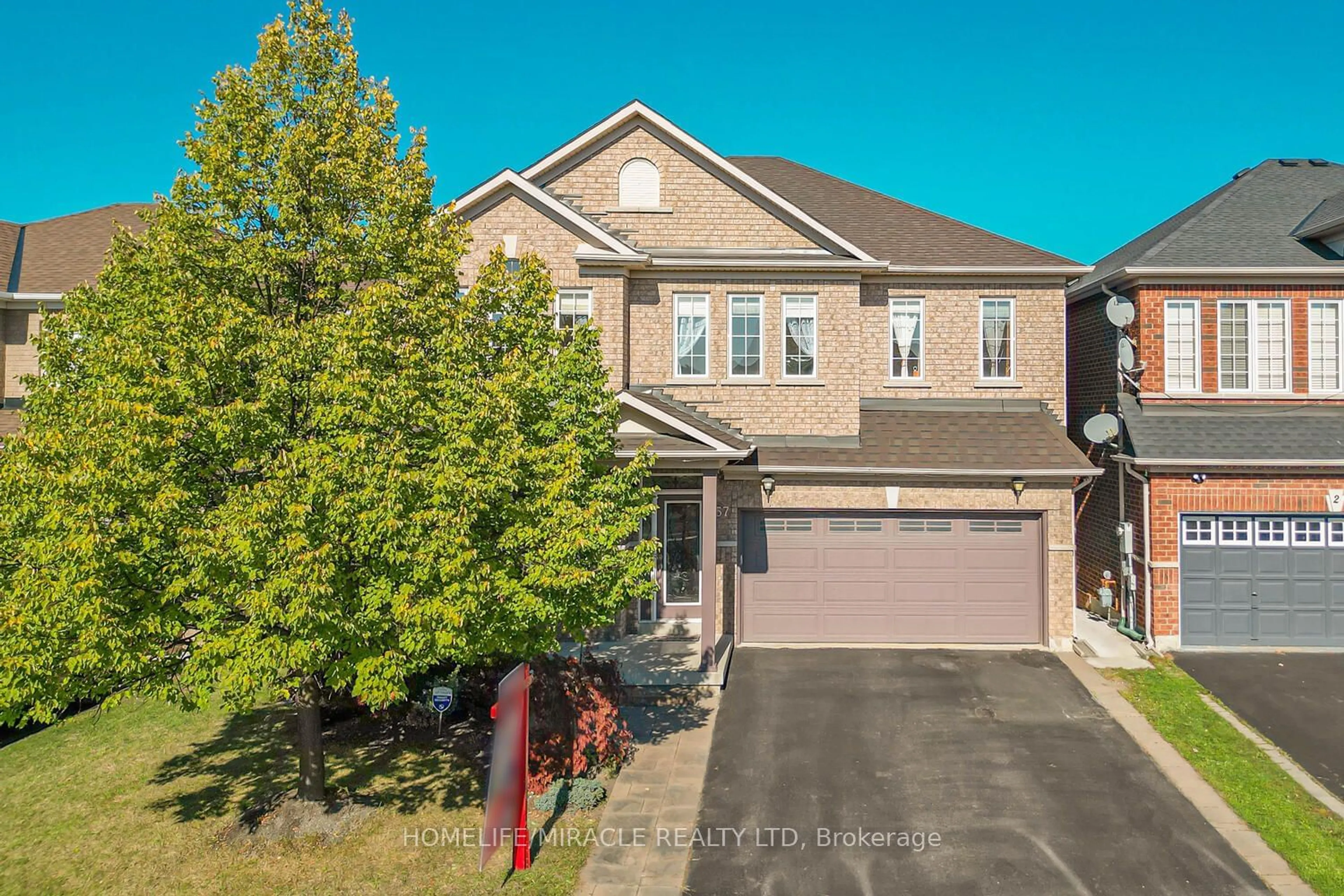 A pic from exterior of the house or condo, the street view for 57 Moldovan Dr, Brampton Ontario L6R 0E4