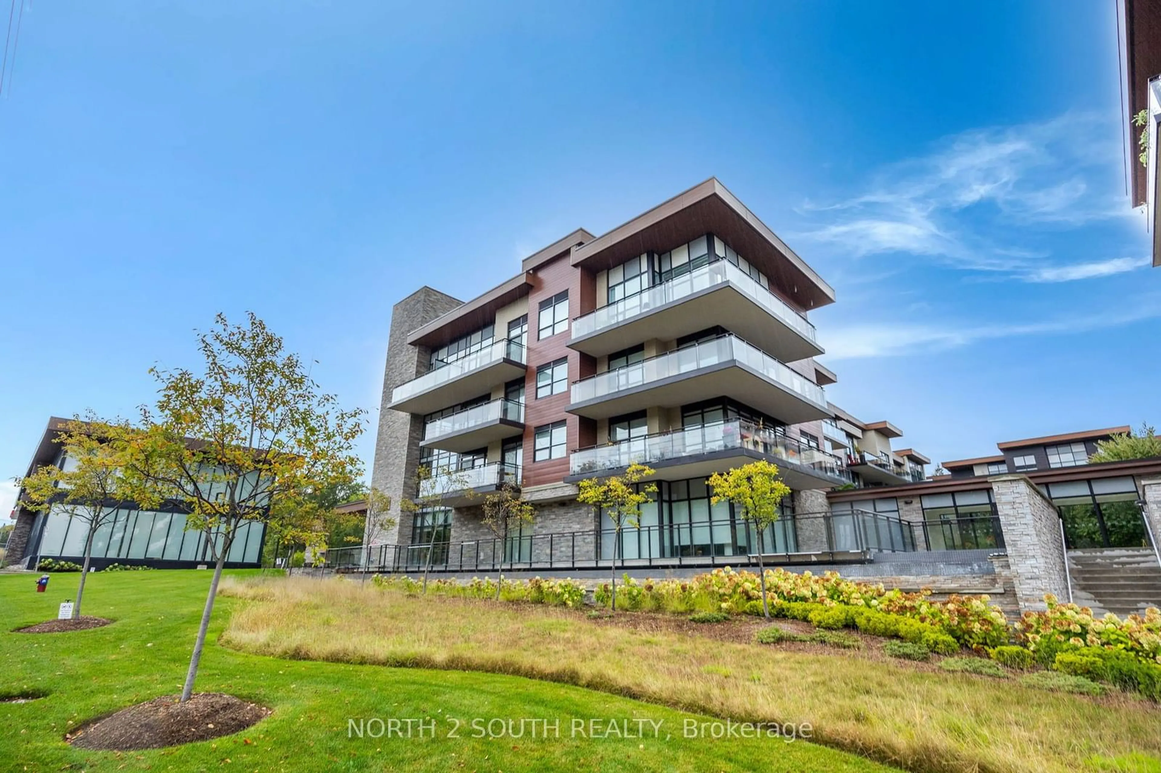 A pic from exterior of the house or condo, the front or back of building for 1575 Lakeshore Rd #418, Mississauga Ontario L5J 0B1