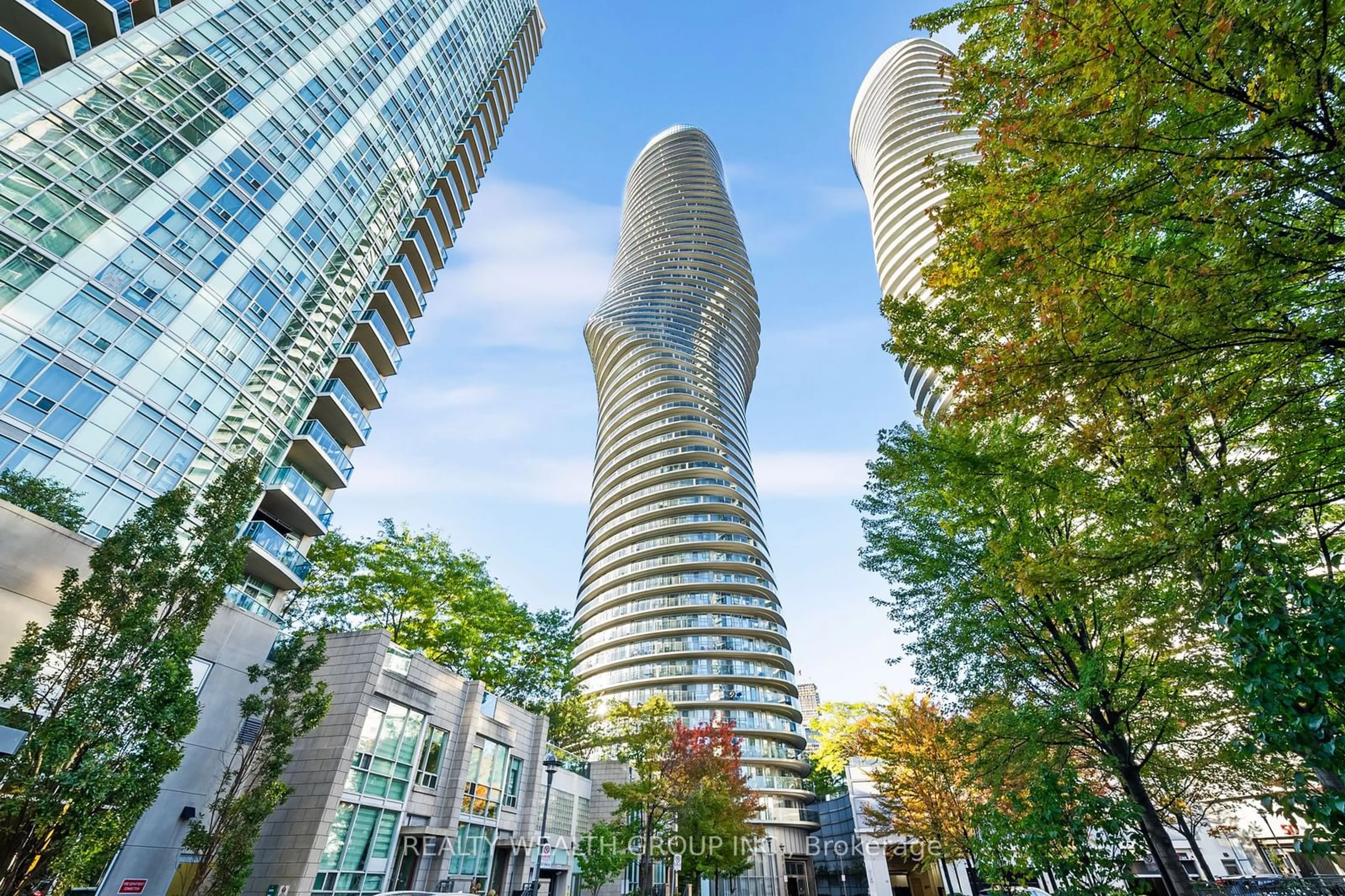 A pic from exterior of the house or condo, the view of city buildings for 60 absolute Ave #302, Mississauga Ontario L4Z 0A9