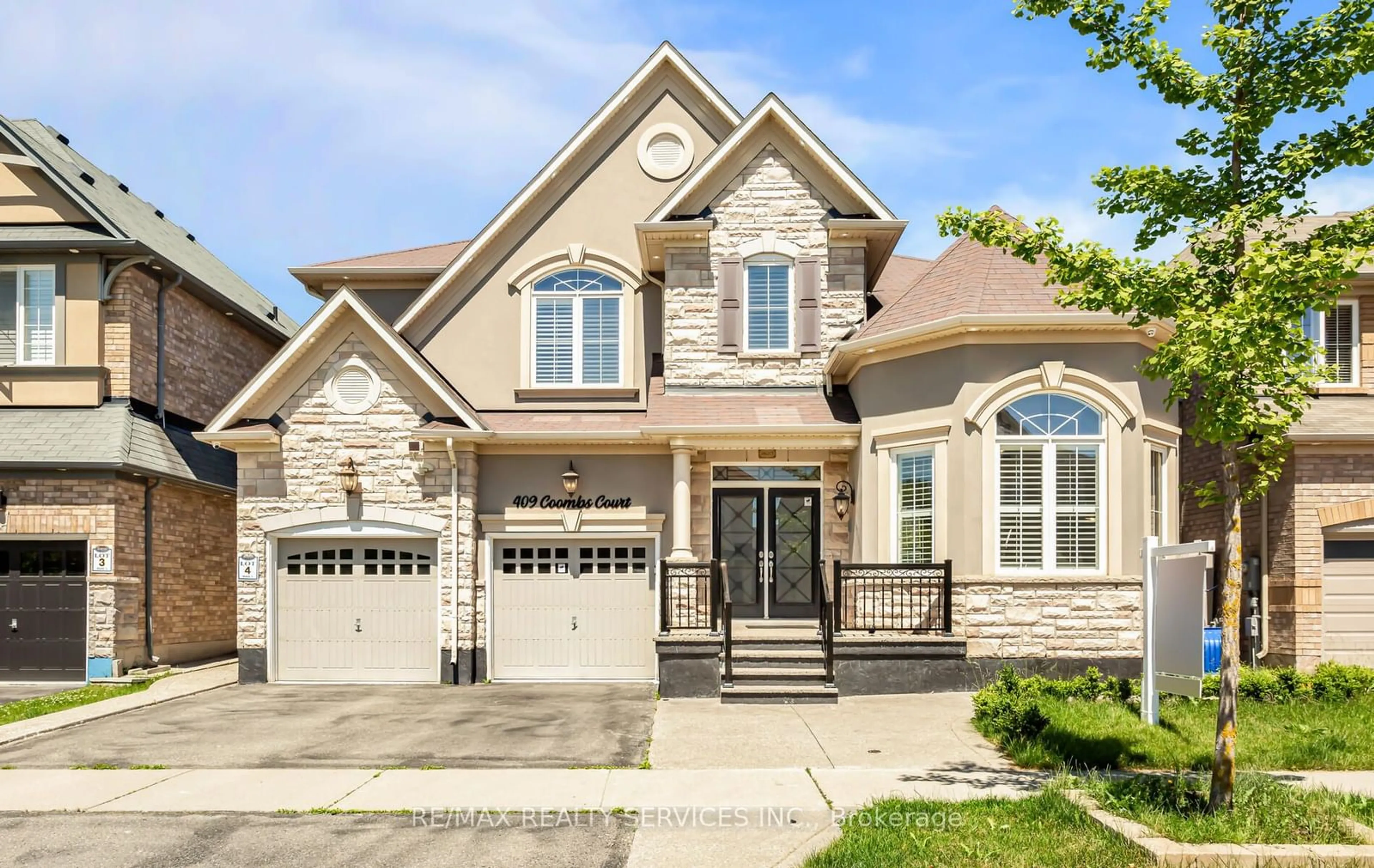 Home with brick exterior material for 409 Coombs Crt, Milton Ontario L9T 7N5