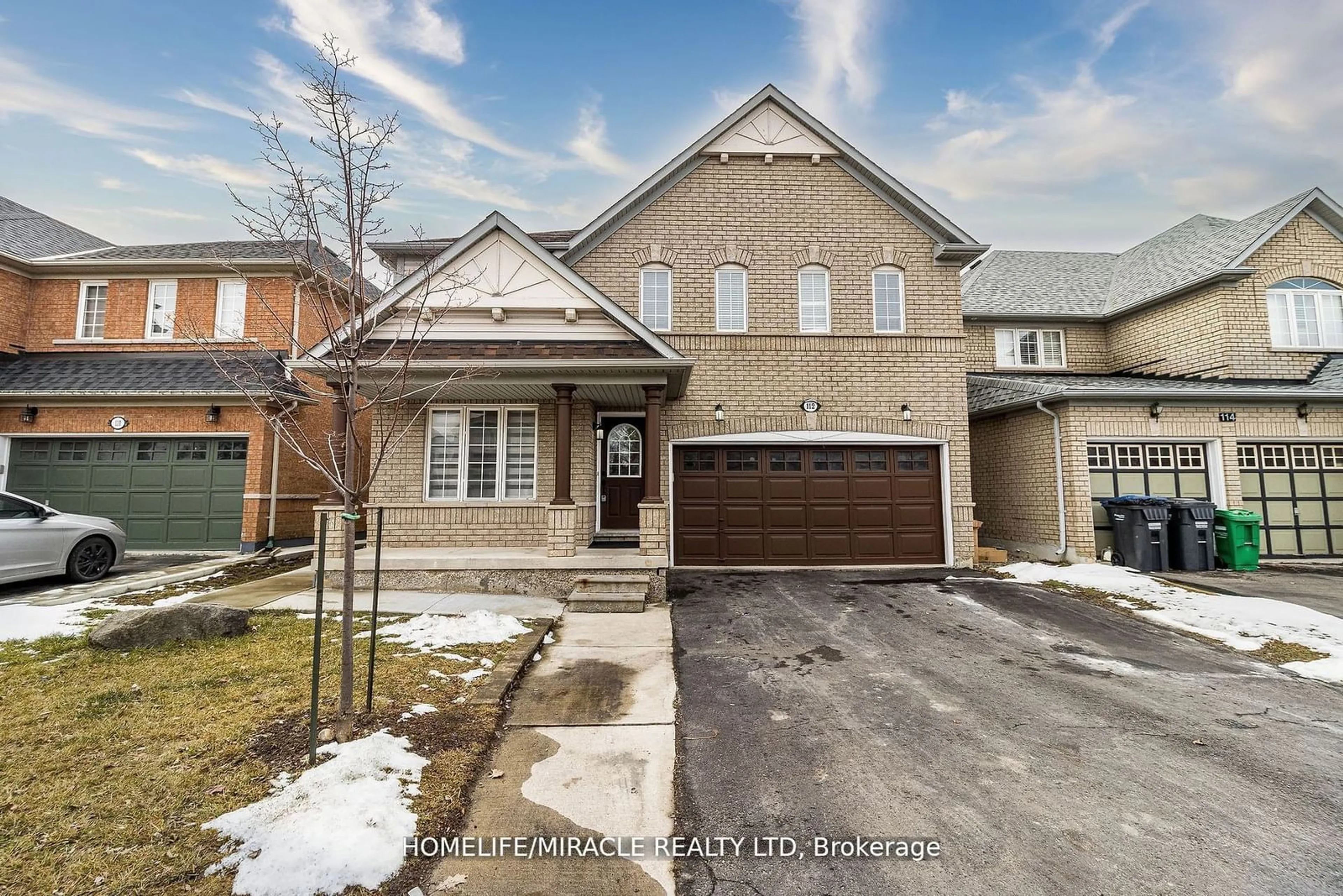 Frontside or backside of a home, the street view for 112 Brisdale Dr, Brampton Ontario L7A 2H2