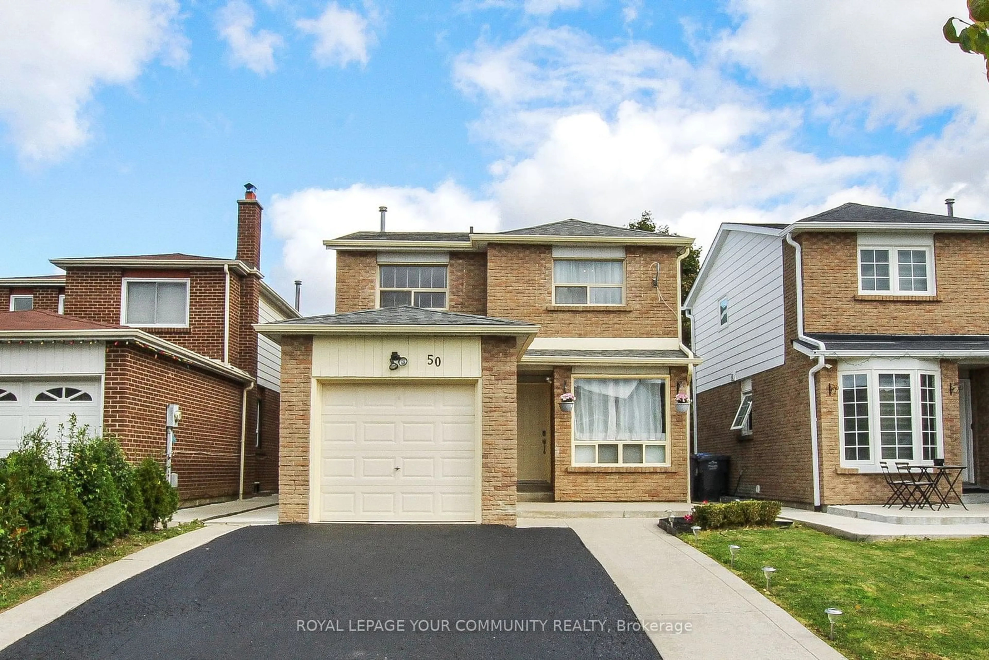 Frontside or backside of a home, the street view for 50 Denlow Dr, Brampton Ontario L6Y 2L5