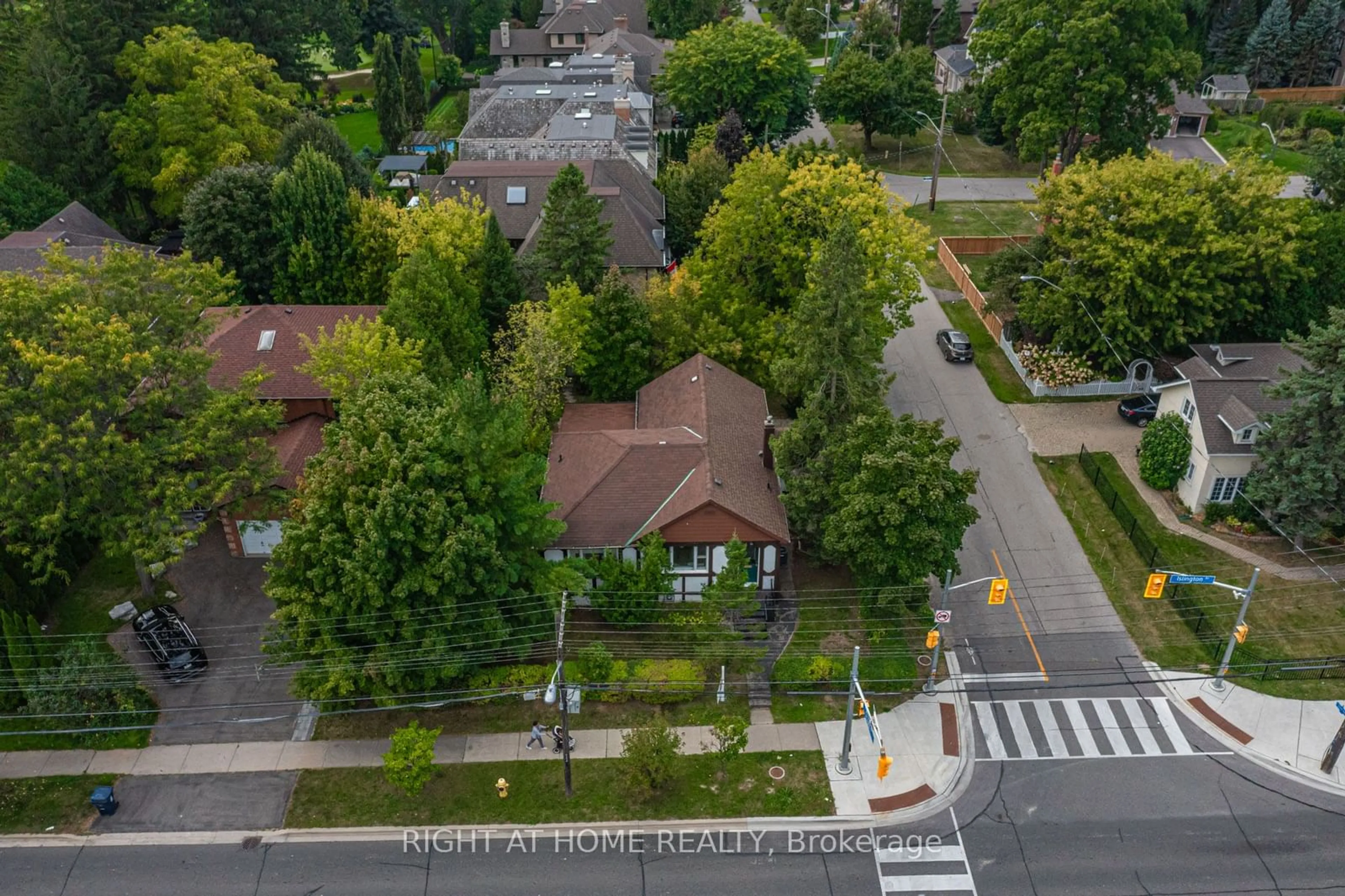 Frontside or backside of a home, the street view for 1416 Islington Ave, Toronto Ontario M9A 3K7