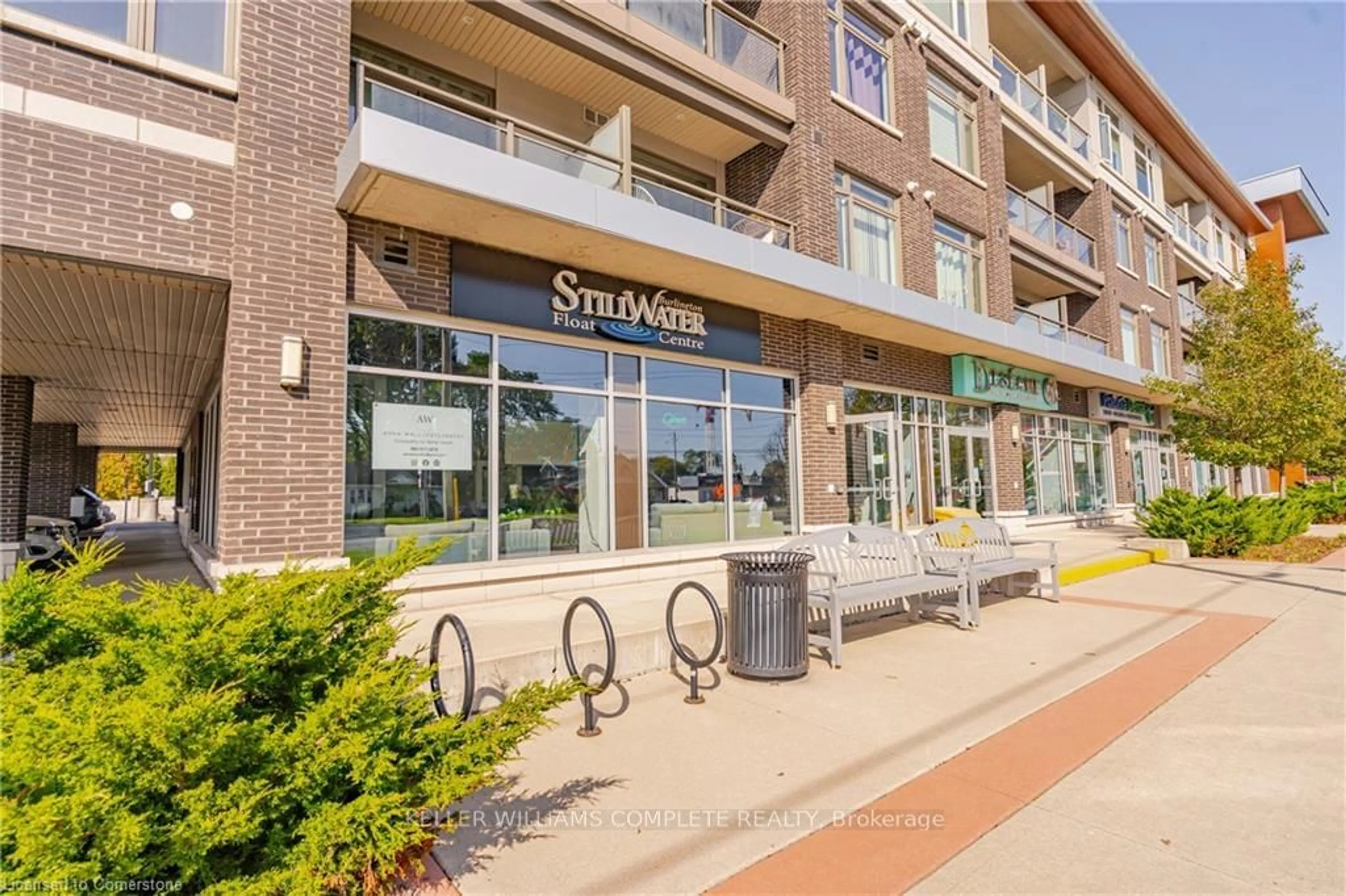 A pic from exterior of the house or condo, the street view for 457 Plains Rd #221, Burlington Ontario L7T 2E2