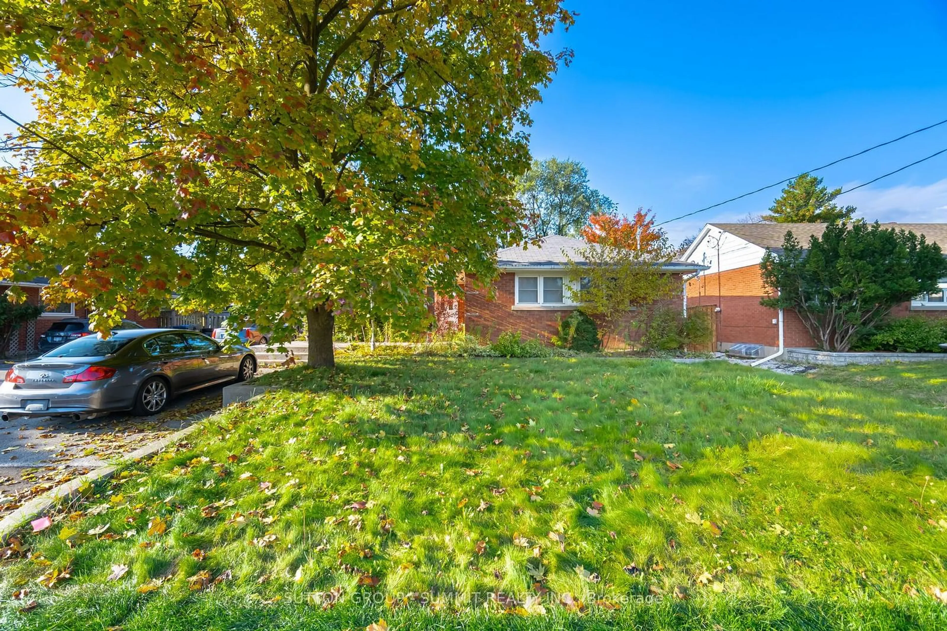 A pic from exterior of the house or condo, the fenced backyard for 8 Joymar Dr, Mississauga Ontario L5M 1E9