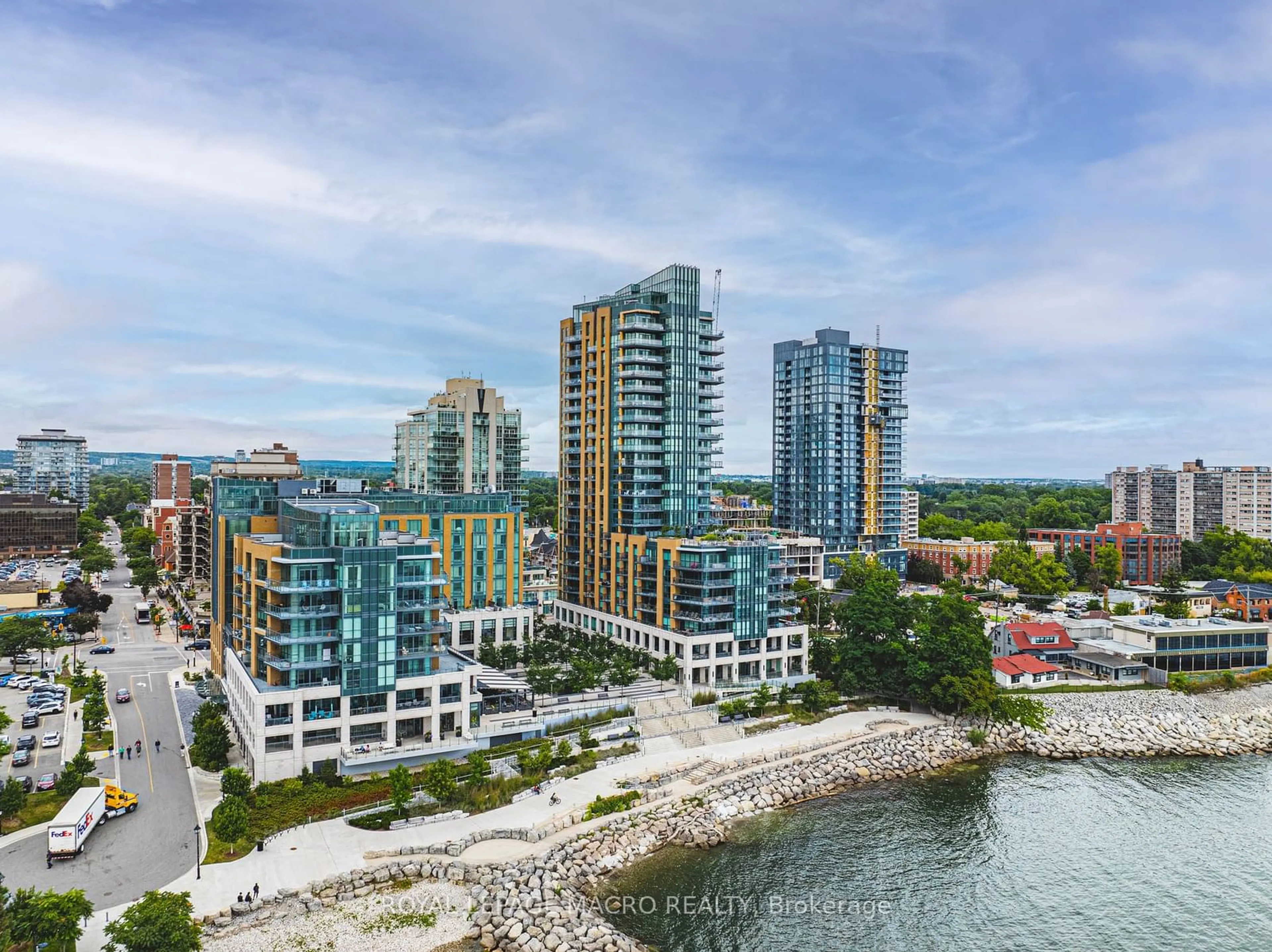 A pic from exterior of the house or condo, the view of city buildings for 2060 Lakeshore Rd #2202, Burlington Ontario L7R 0G2