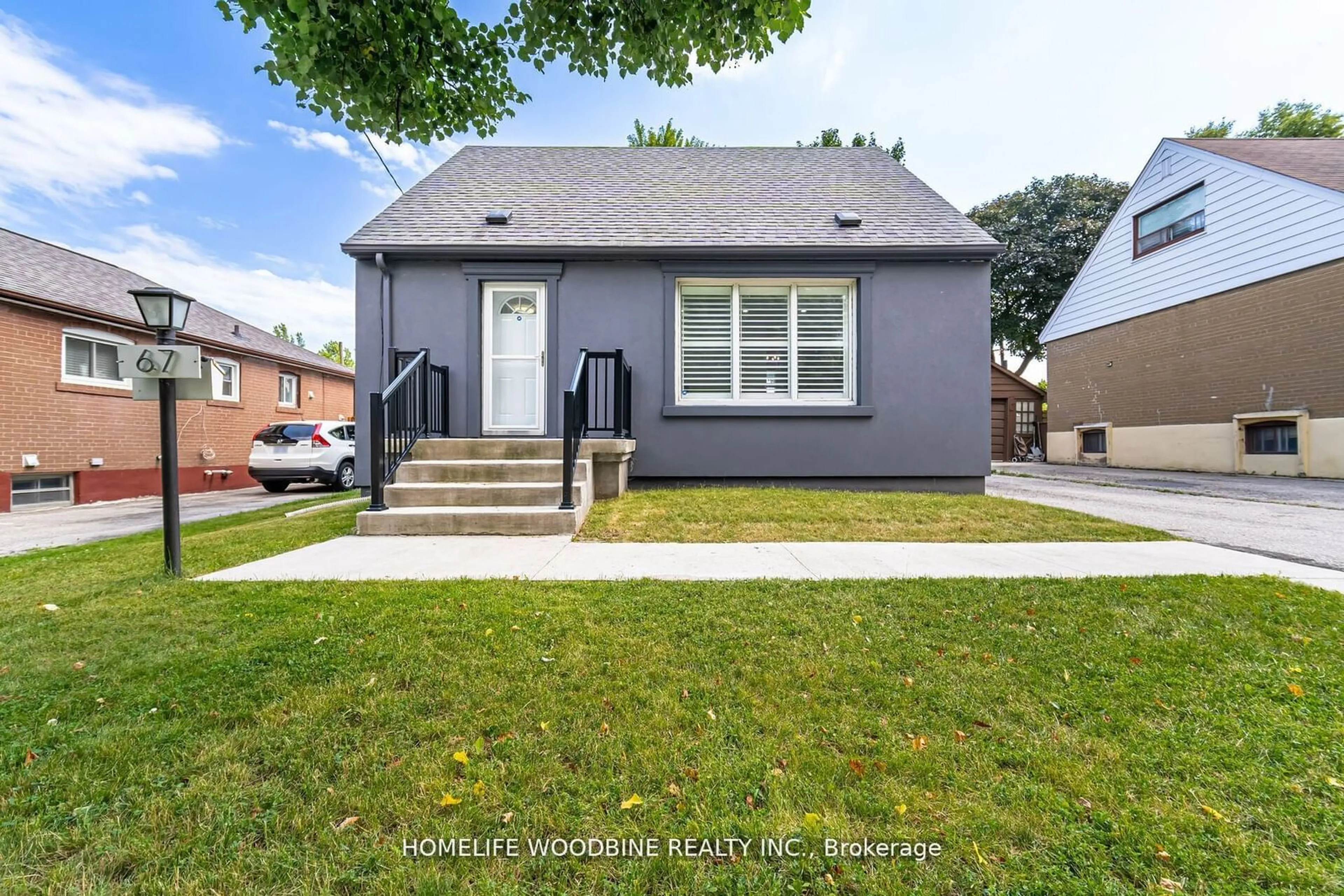 Frontside or backside of a home, the fenced backyard for 67 Allenby Ave, Toronto Ontario M9W 1S7