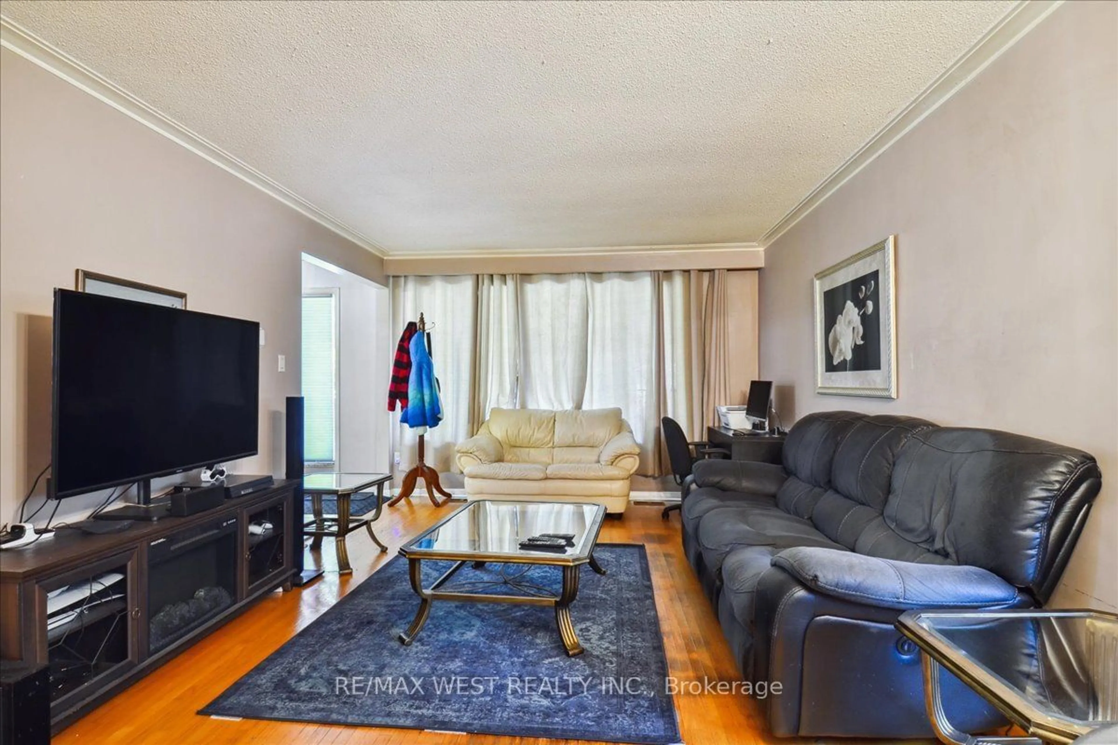 Living room, wood floors for 14 Oxenden Cres, Toronto Ontario M9C 4H4