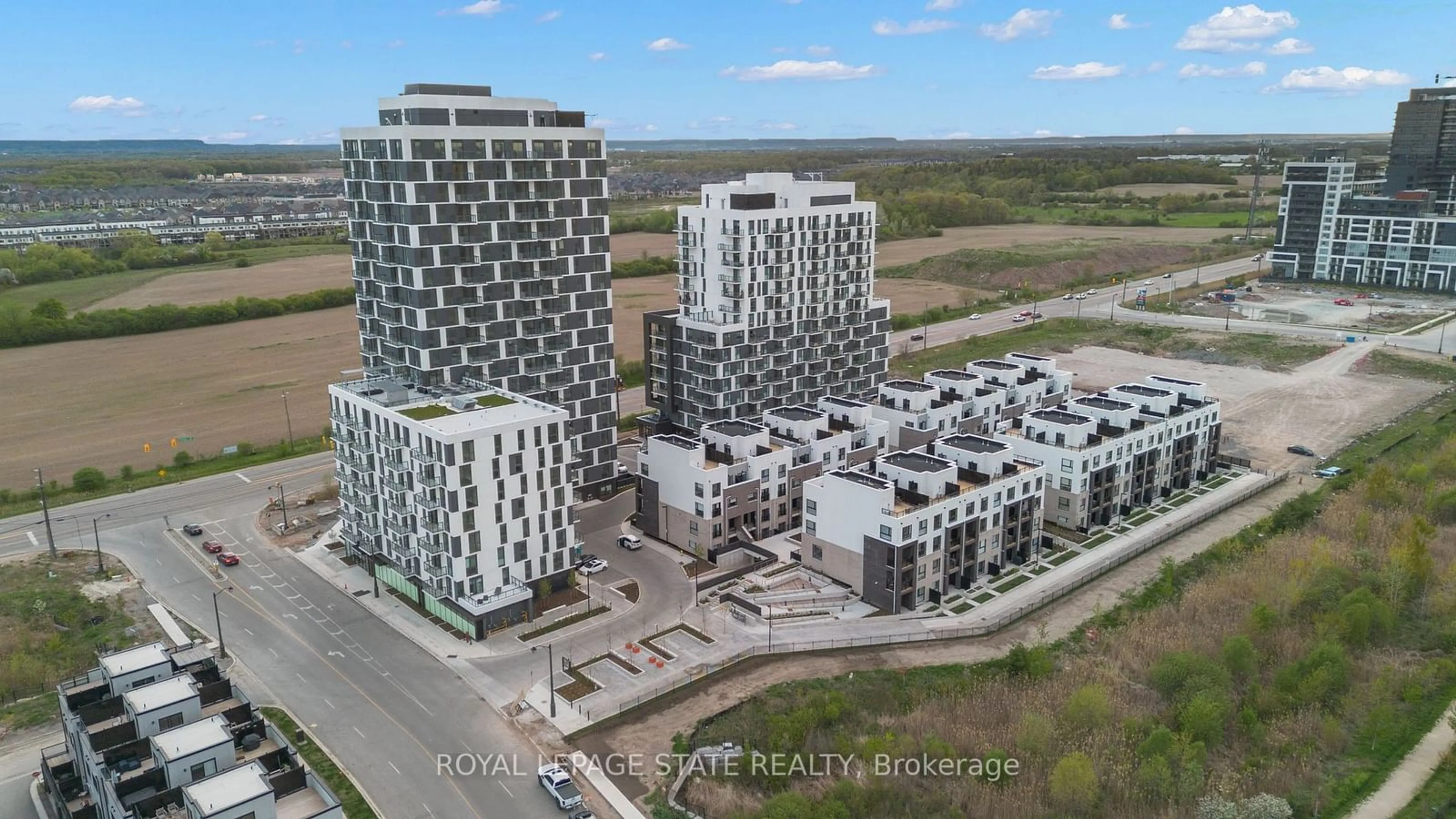 A pic from exterior of the house or condo, the view of city buildings for 335 Wheat Boom Dr #1604, Oakville Ontario L6H 7Y1