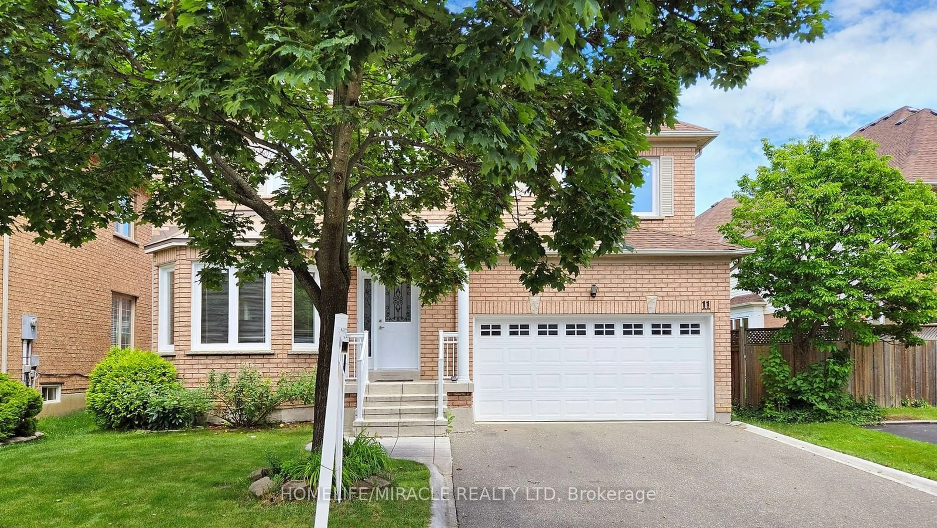 A pic from exterior of the house or condo, the street view for 11 BADGER Ave, Brampton Ontario L6R 1Z1