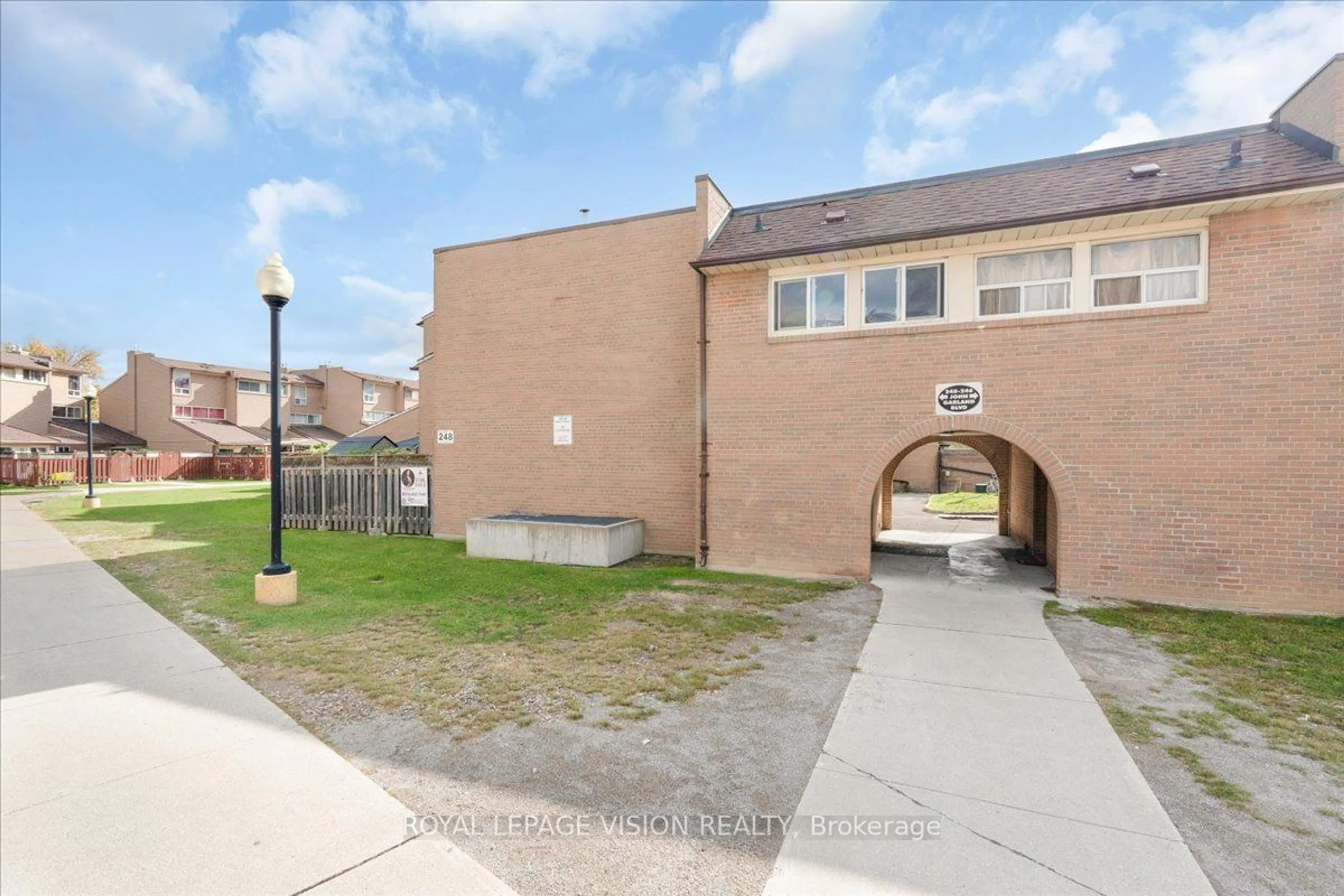 A pic from exterior of the house or condo, the front or back of building for 248 John Garland Blvd #79, Toronto Ontario M9V 1N8