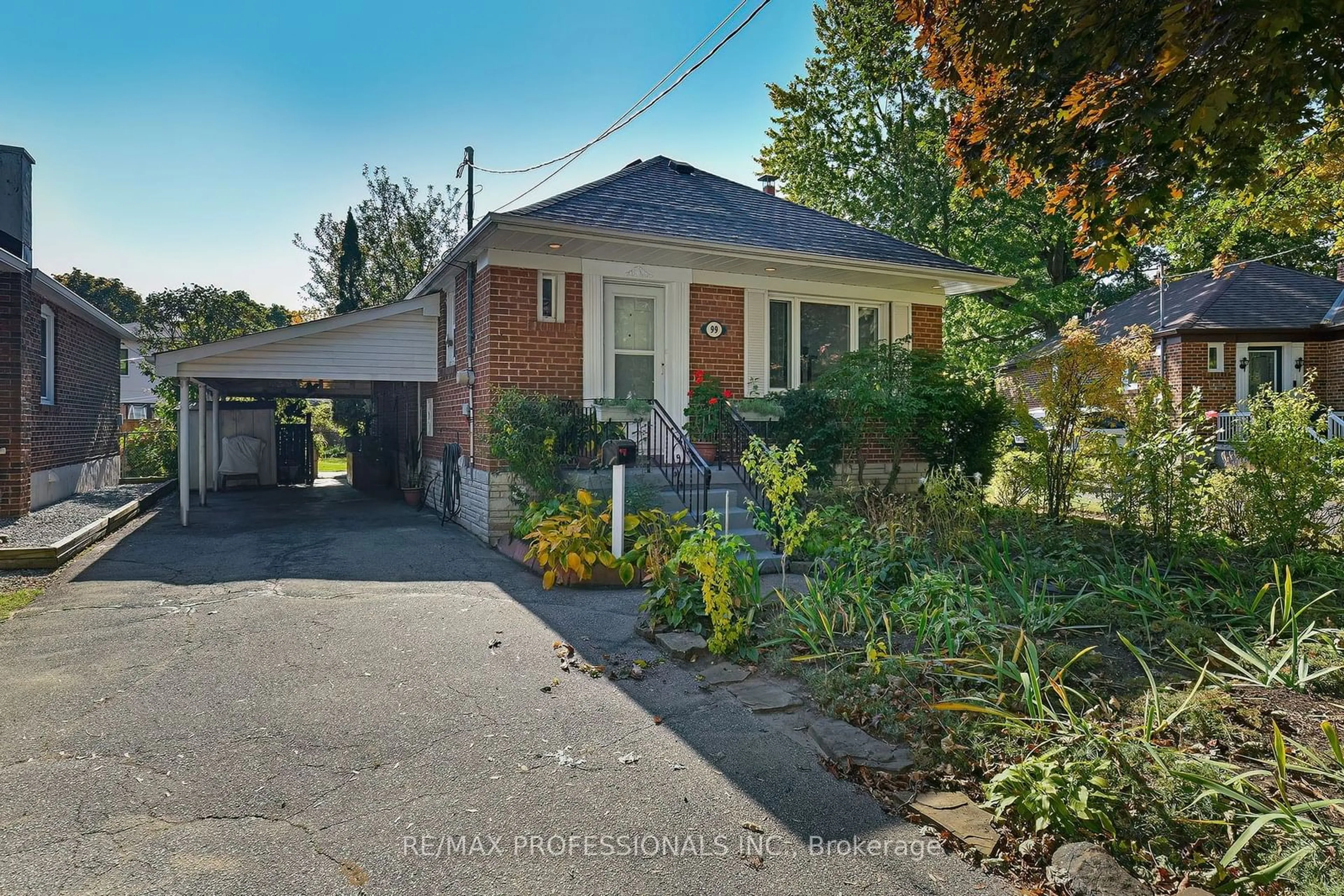 Frontside or backside of a home, the street view for 99 Burlingame Rd, Toronto Ontario M8W 1Z1